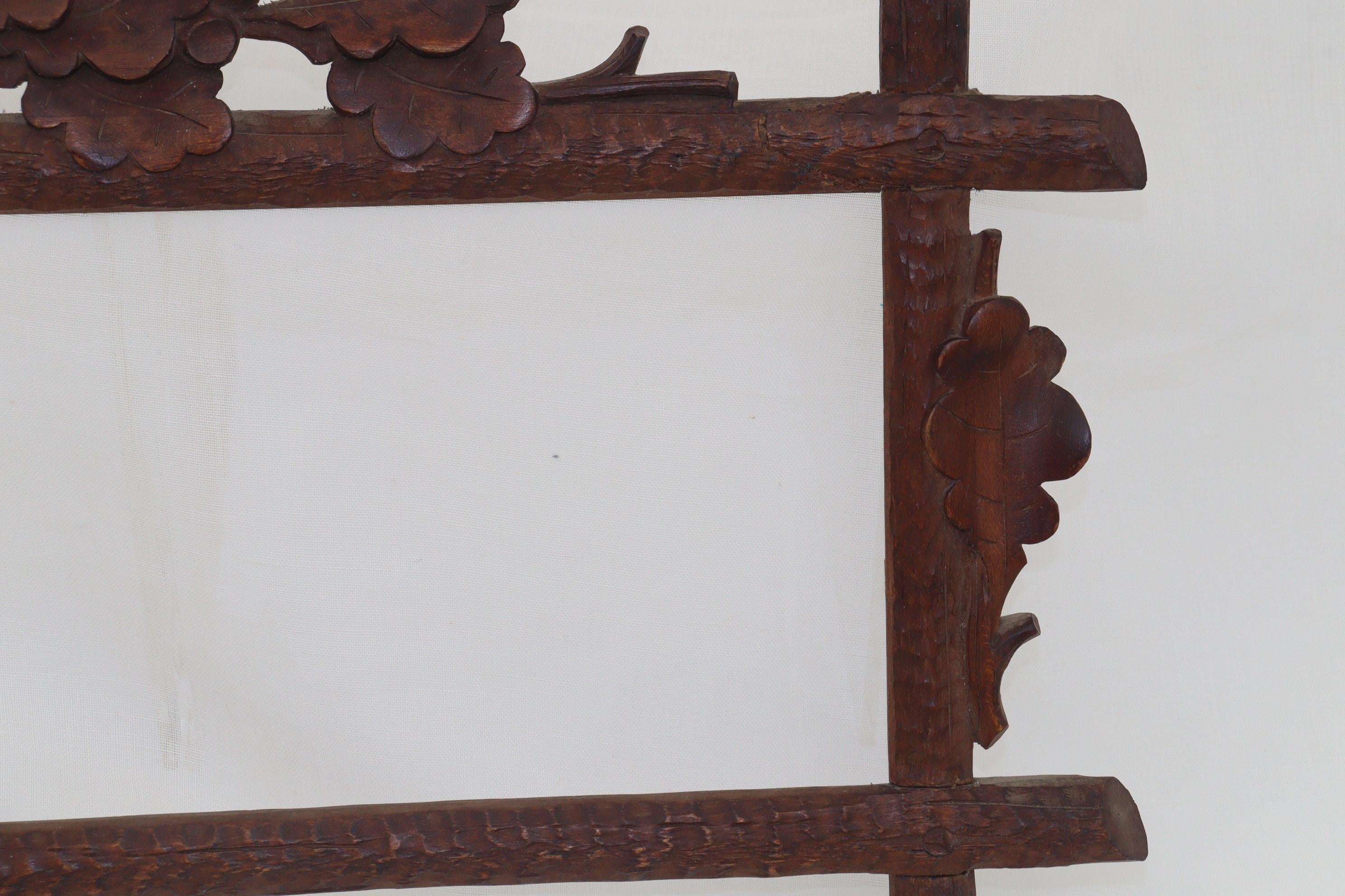Hand-Carved Small Black Forest carved picture frame For Sale