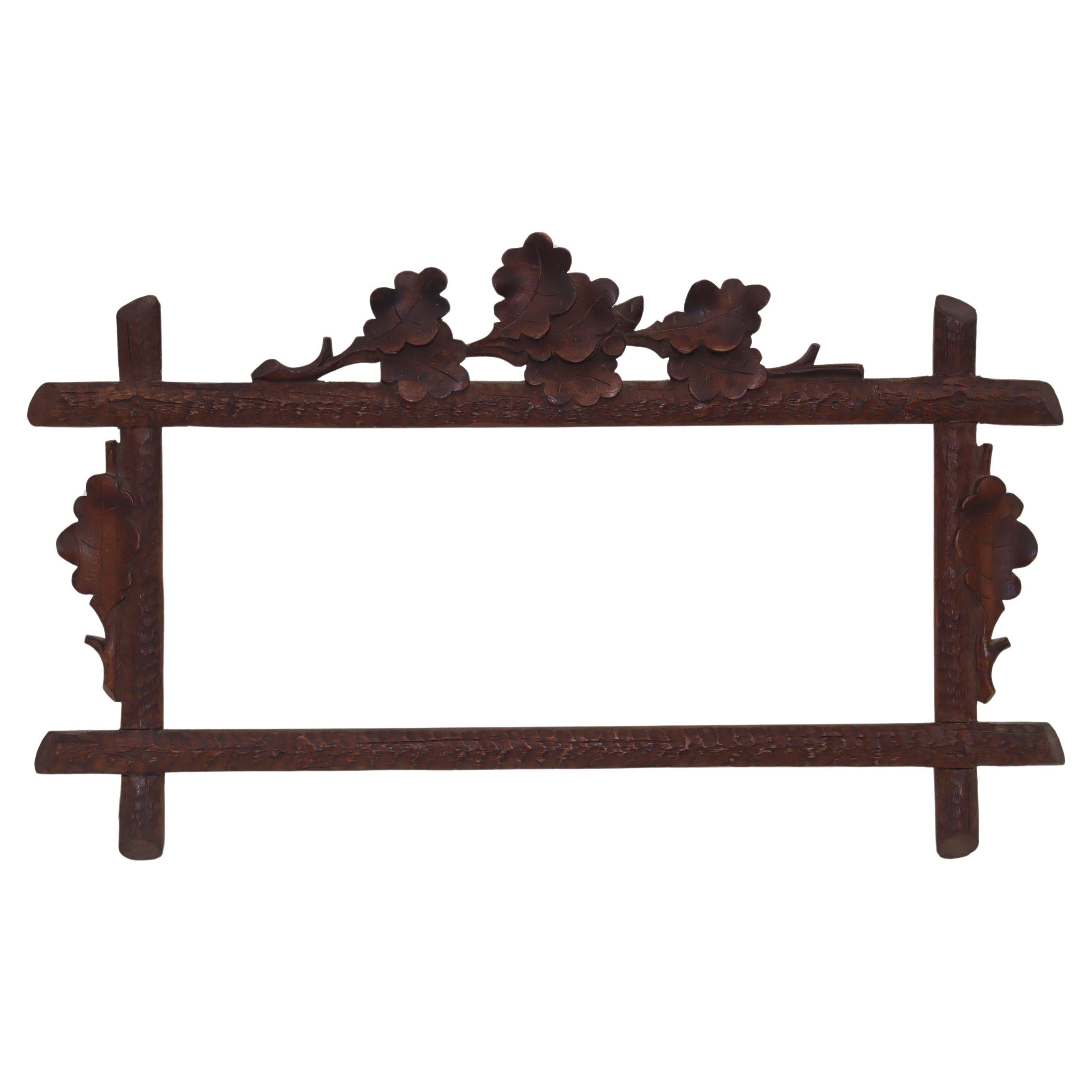 Small Black Forest carved picture frame For Sale