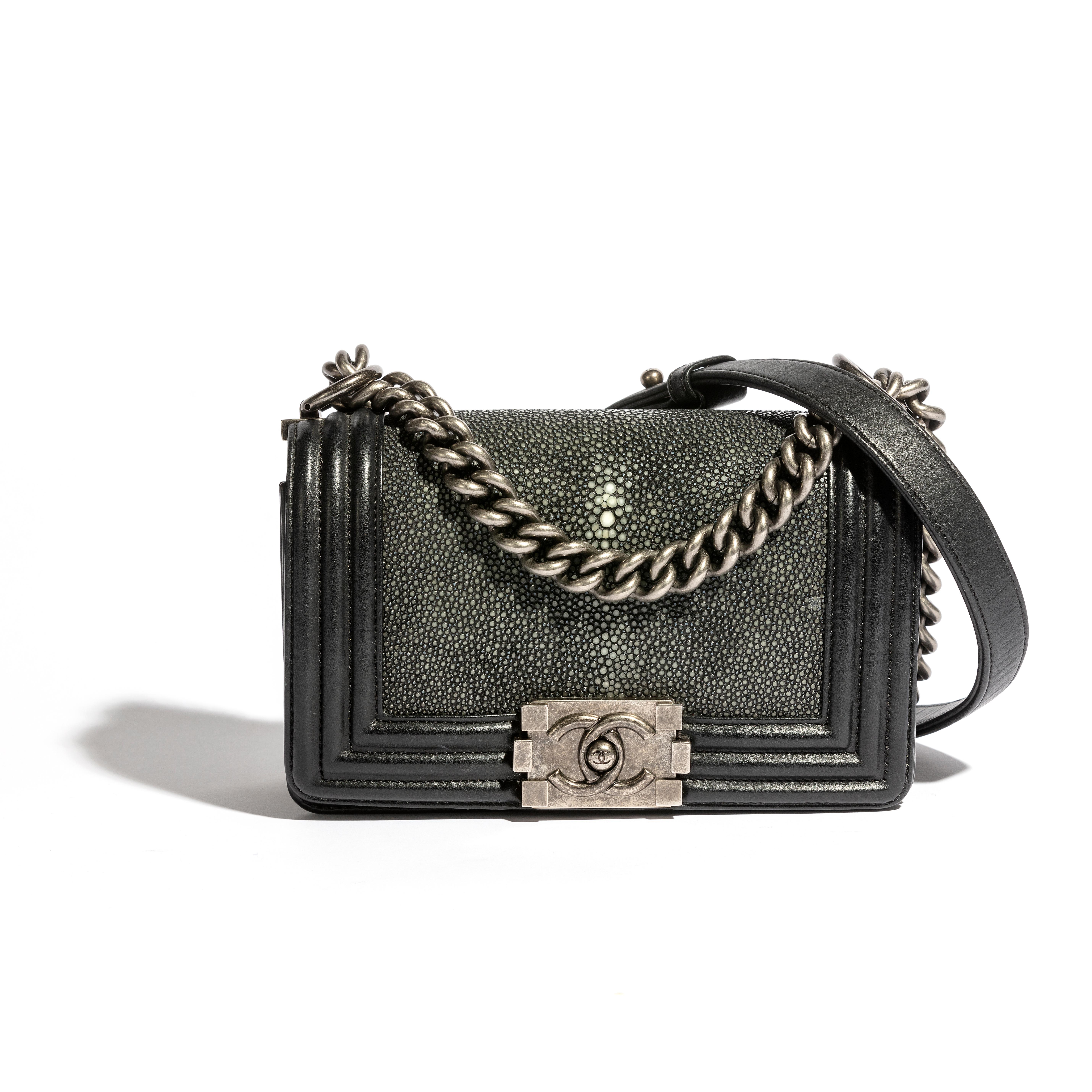 This Chanel Mini Boy Flap is one of the iconic designs created by Karl Lagerfeld to pay homage to Gabrielle Chanel's first love, Boy Chapel. With a rectangular shape, a large chain, and graphic clasps with its iconic CC, it's a Chanel classic. This