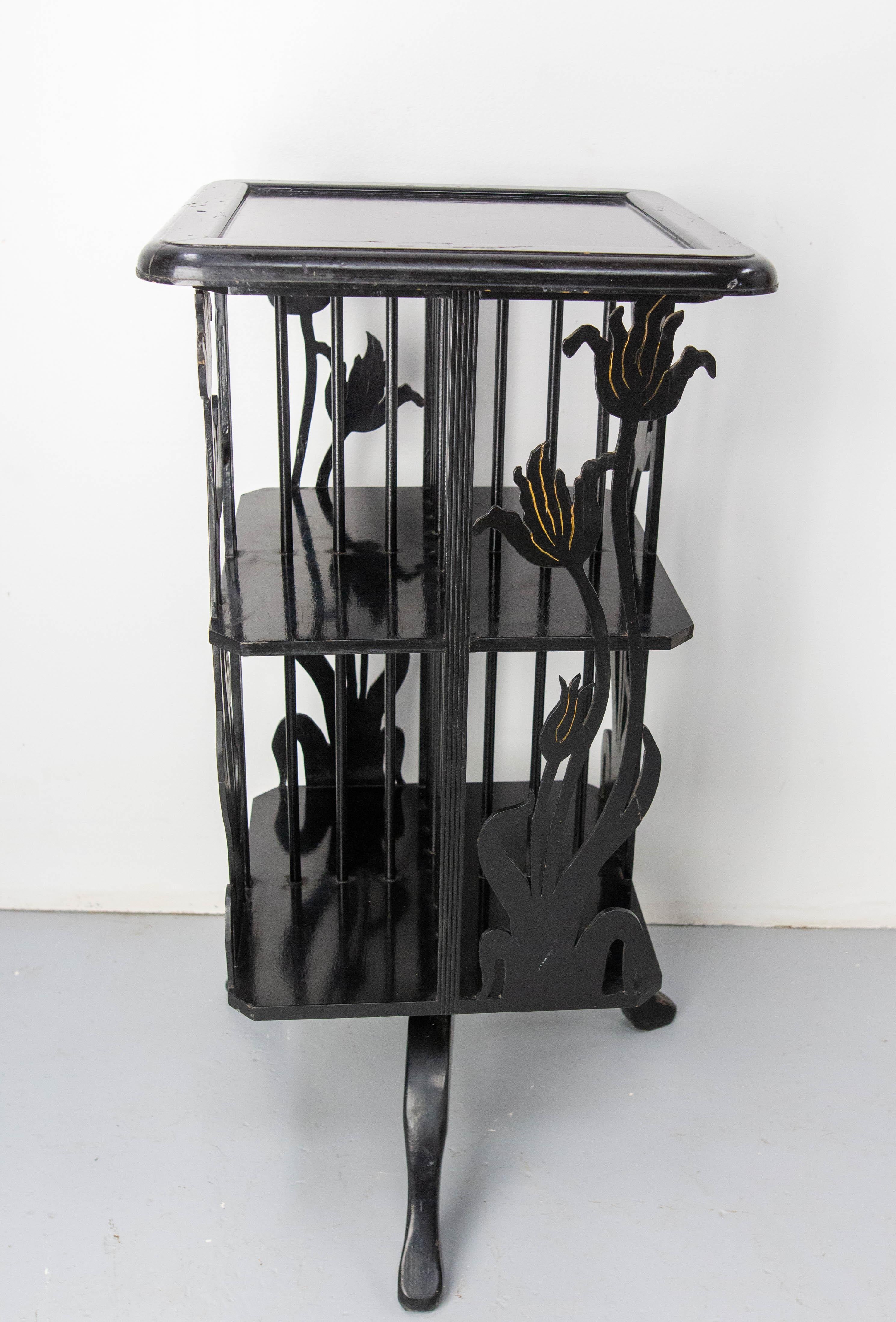 Antique rotating library or spinning bookcase, black lacquered.
Made circa 1910-1020 in the art nouveau period. The flowers are peony which are flowers typically used during the french art nouveau period.
Top dimension: 18.11 x 18.11 in. (46 x 46