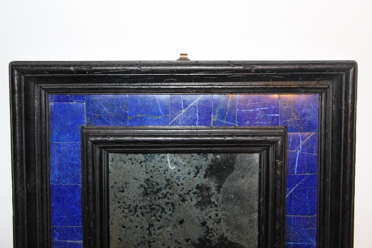 Small blackened wood mirror and lapis lazuli veneer with its mercury mirror (mirror weathered) in very good condition.