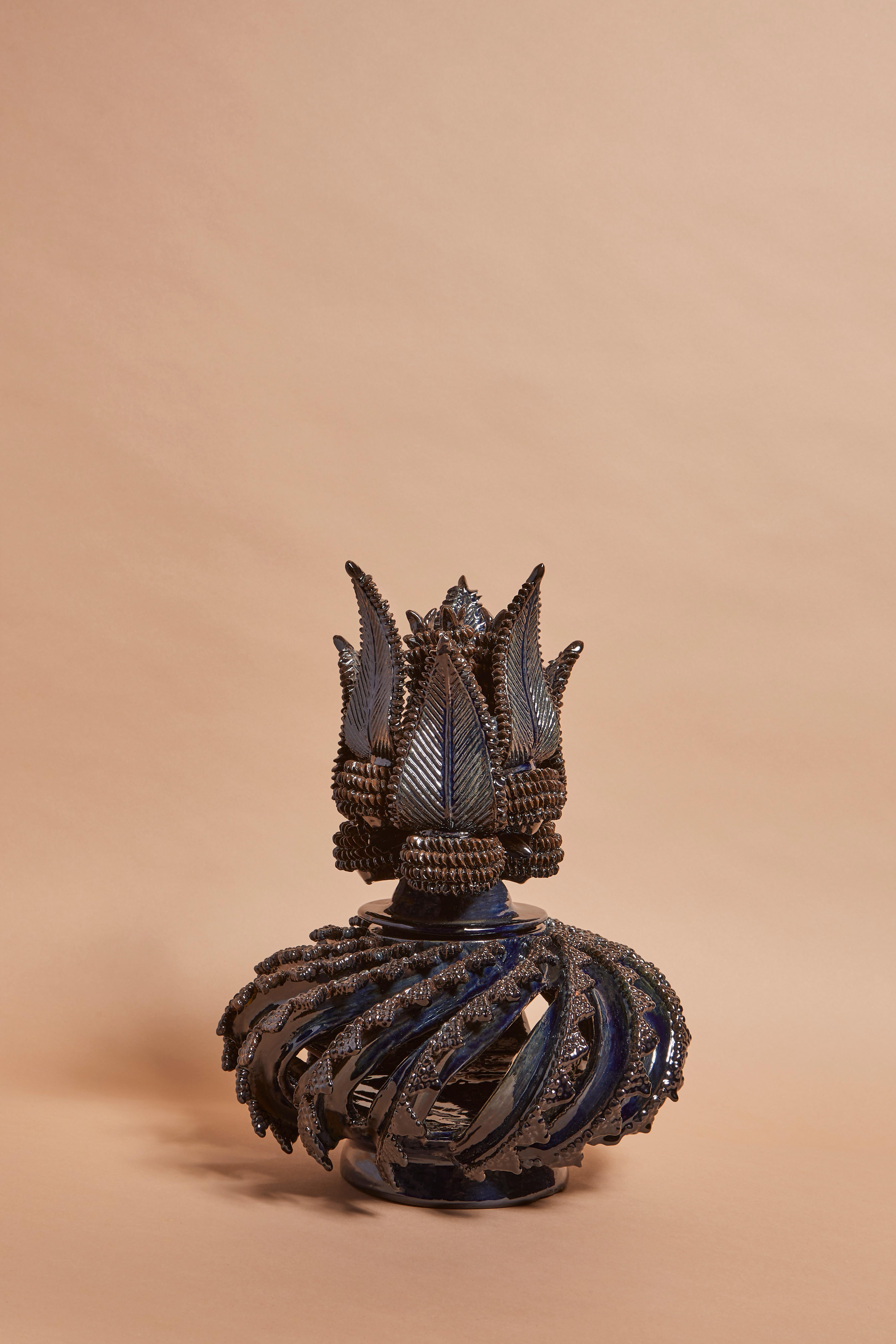Benjamin and Miriam, founders of Objekti, discovered the pines on a trip to Mexico and fell instantly in love with these unique and rare pieces. The pine, a symbol long associated with goodwill, is turned into masterpieces by some of Mexico's most