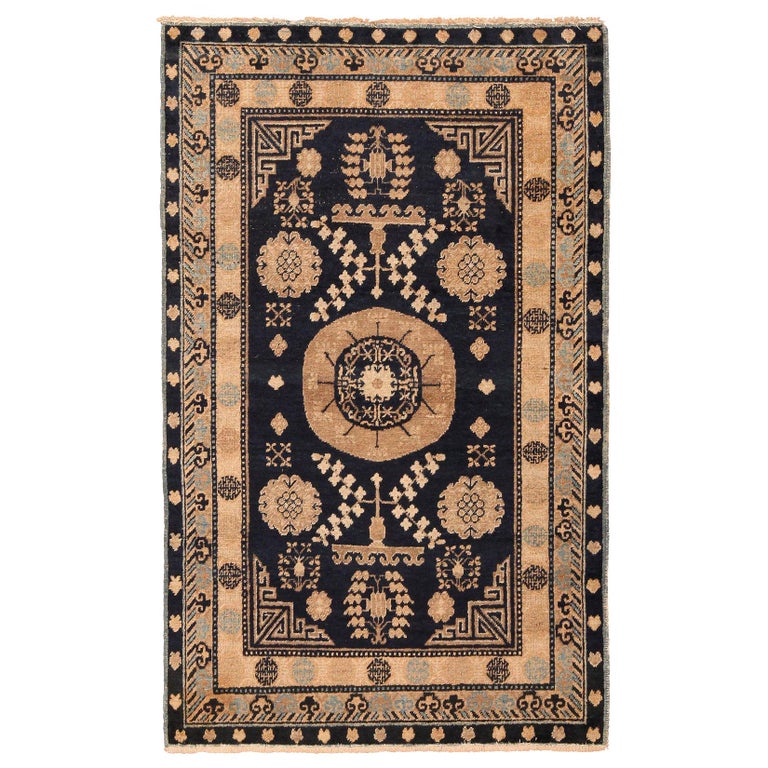 Small Blue Background Antique Khotan Rug at 1stDibs