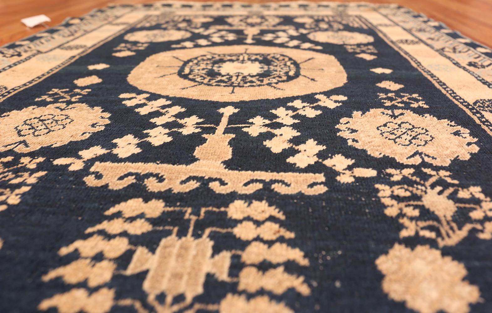 East Turkestani Small Blue Background Antique Khotan Rug