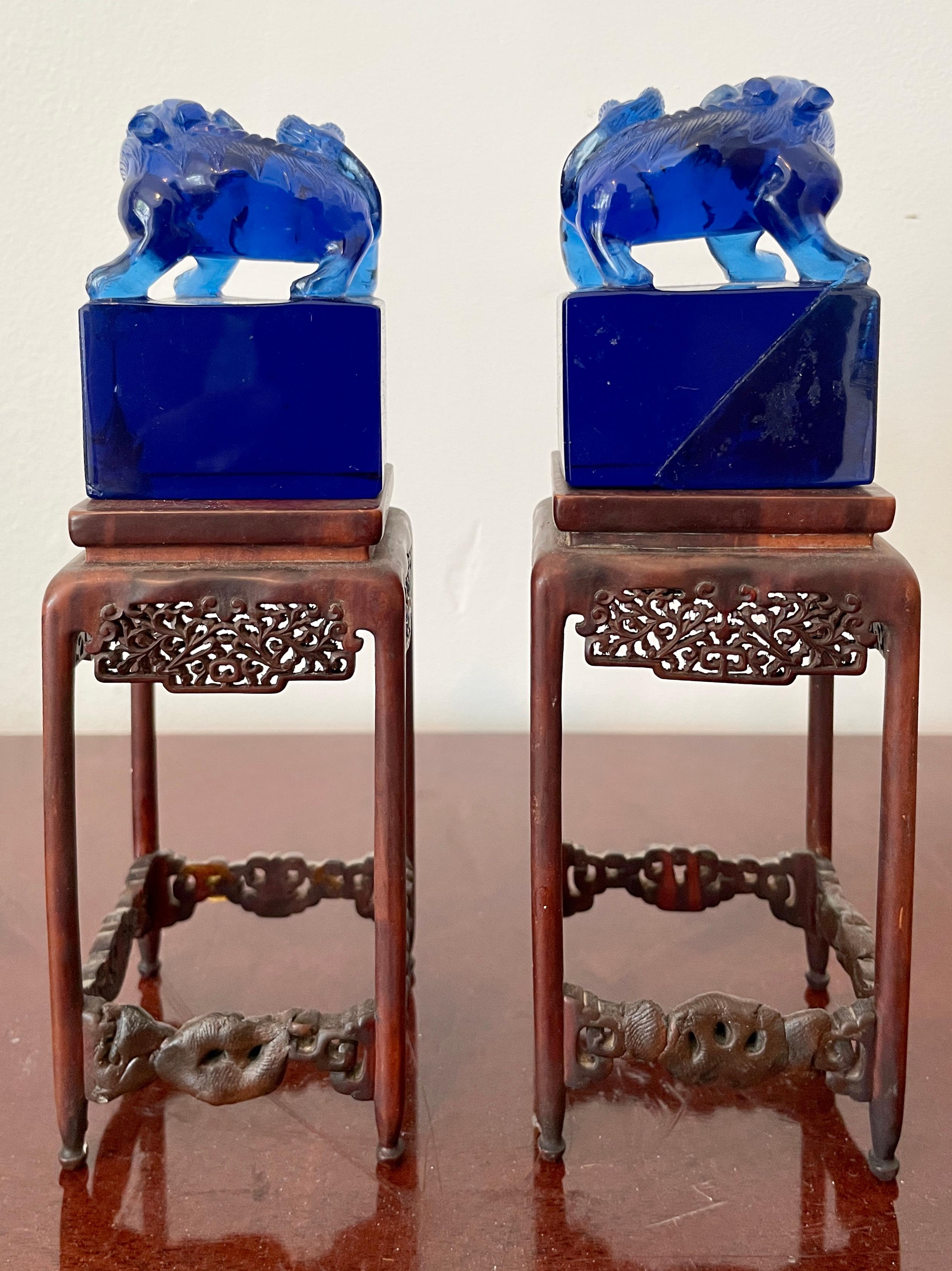 Chinese Small Blue Glass Foo Dogs on a Base, a Pair For Sale