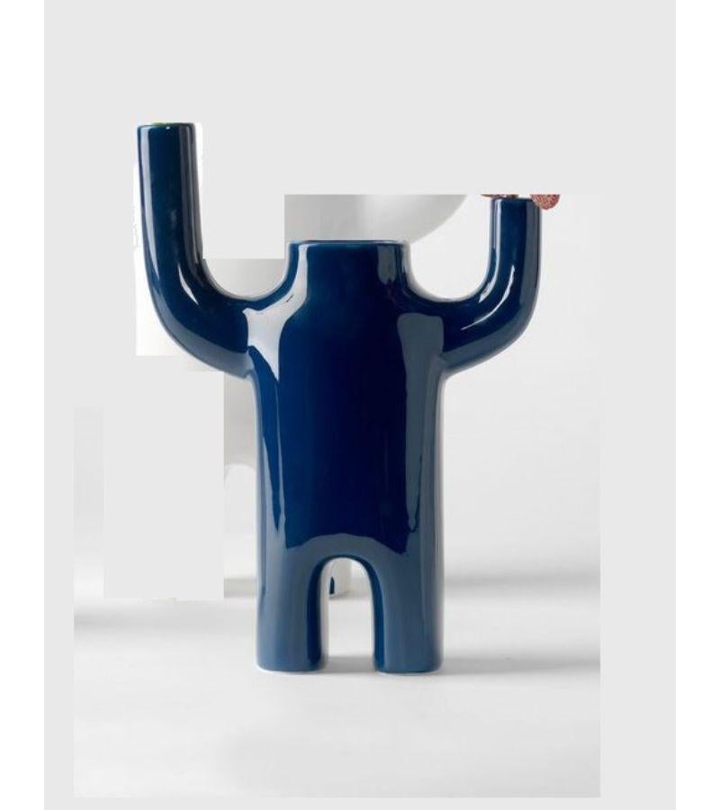 Small blue happy susto vase by Jaime Hayon 
Dimensions: D 10 x W 24 x H 34 cm 
Materials: Glazed ceramic vase(s) in white or blue with decorations in white or blue.
Also available in size Large and in color White. Please contact us for more