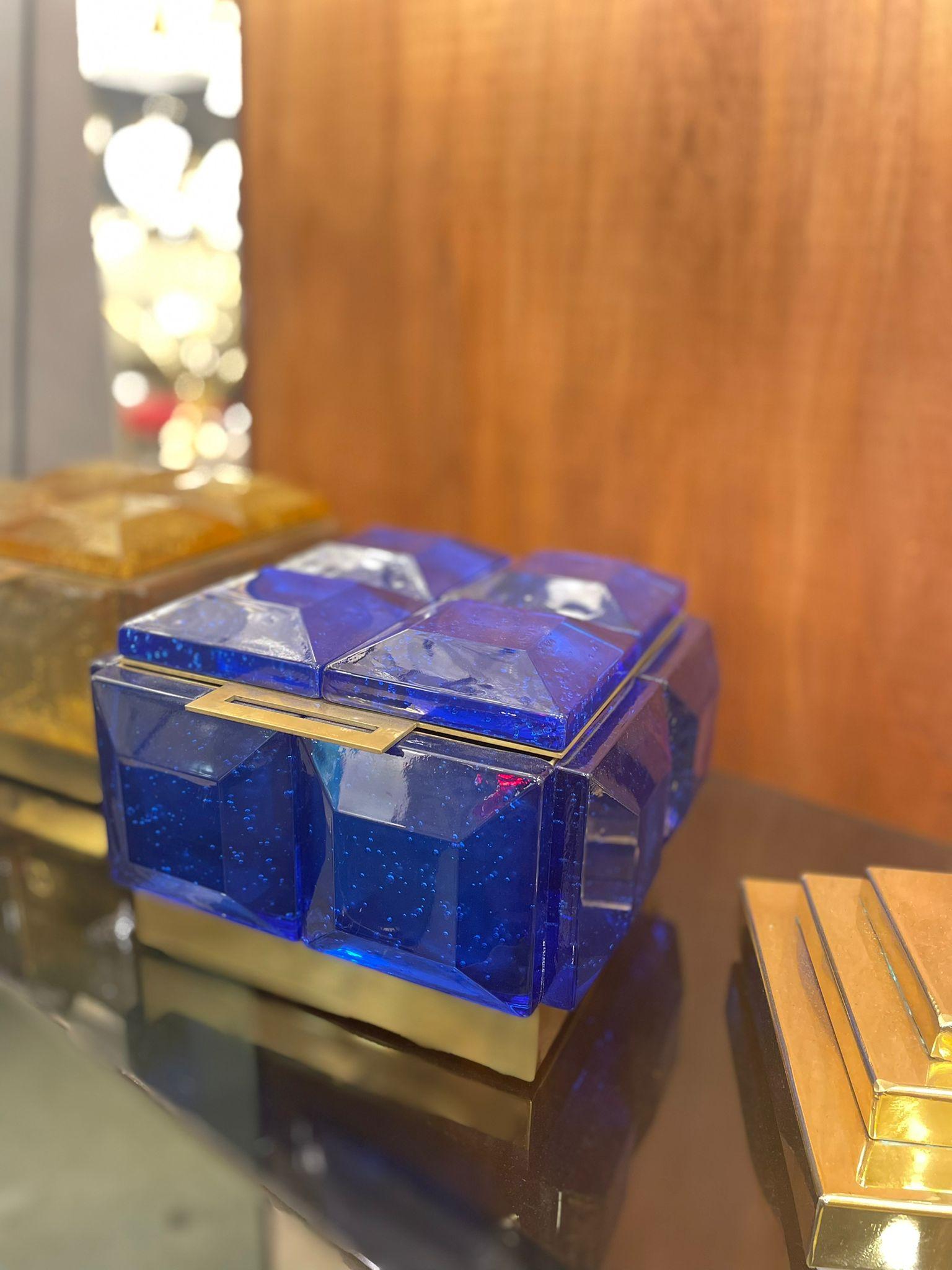 Small box in blue Murano glass with polished brass inner core.