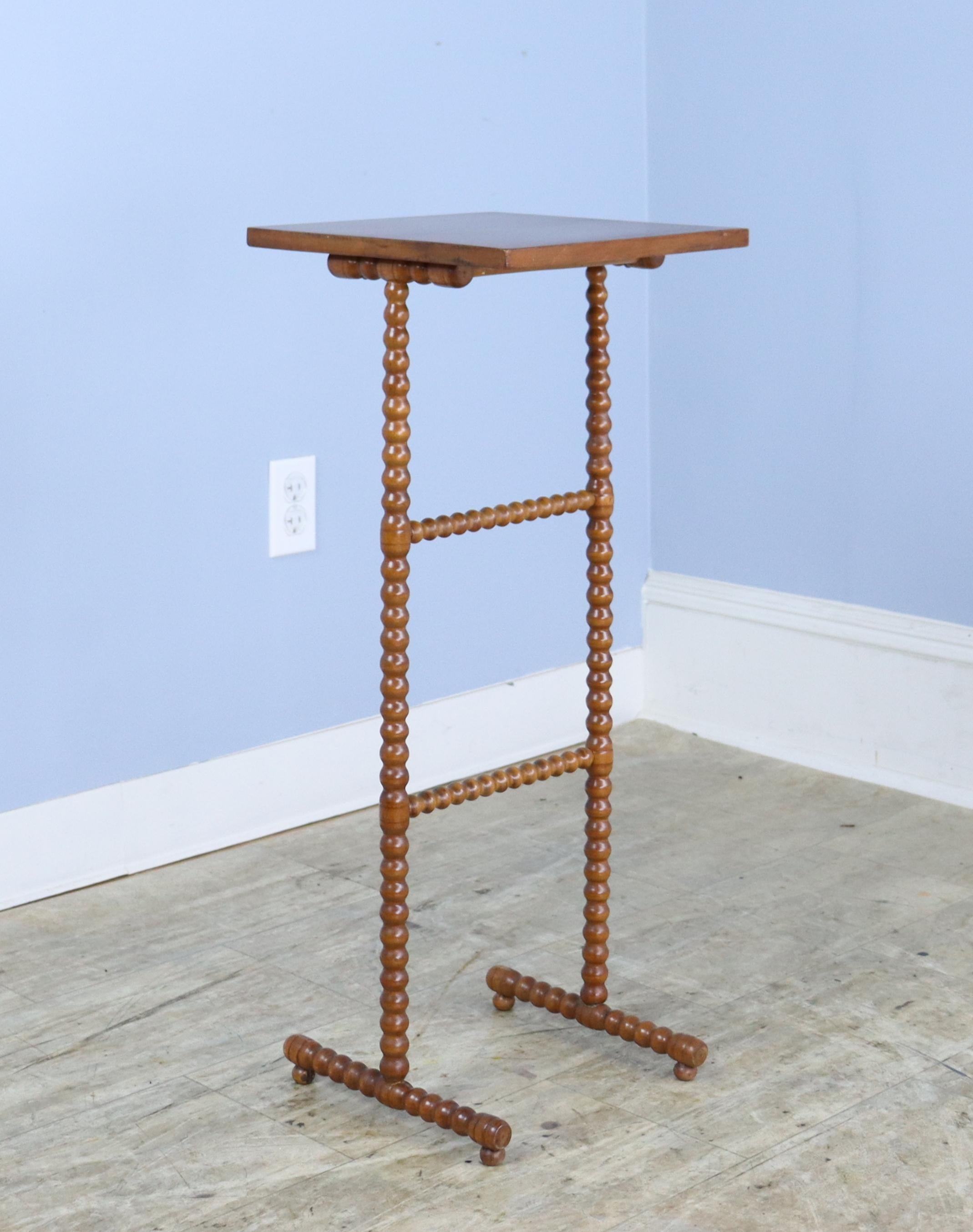 A small delicate side table with charming bobbin legs.  Would pair nicely with our other bobbin legged side table, reference number 0623-MJ8B.