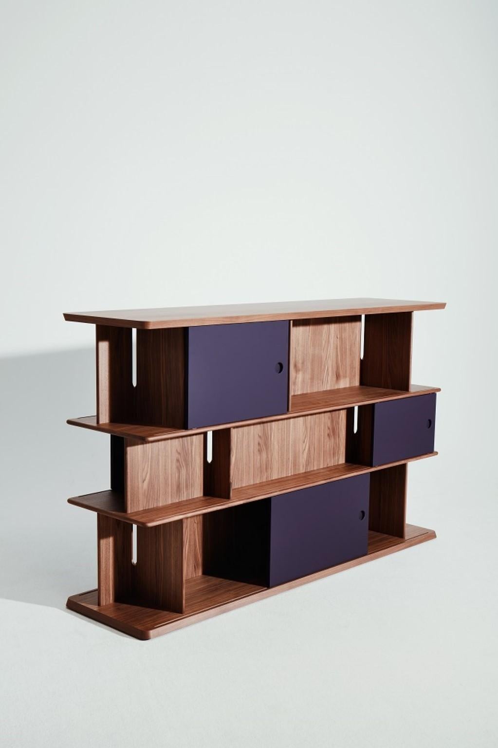 Small Bookshelf by Neri&Hu
Dimensions: W 201.8 x D 55 x H 123 cm
Materials: Canaletto walnut veneer wood
Doors: Dark green, prune, warm white lacquered mdf

Founded in 2004 by partners Lyndon Neri and Rossana Hu, Neri&Hu Design and Research