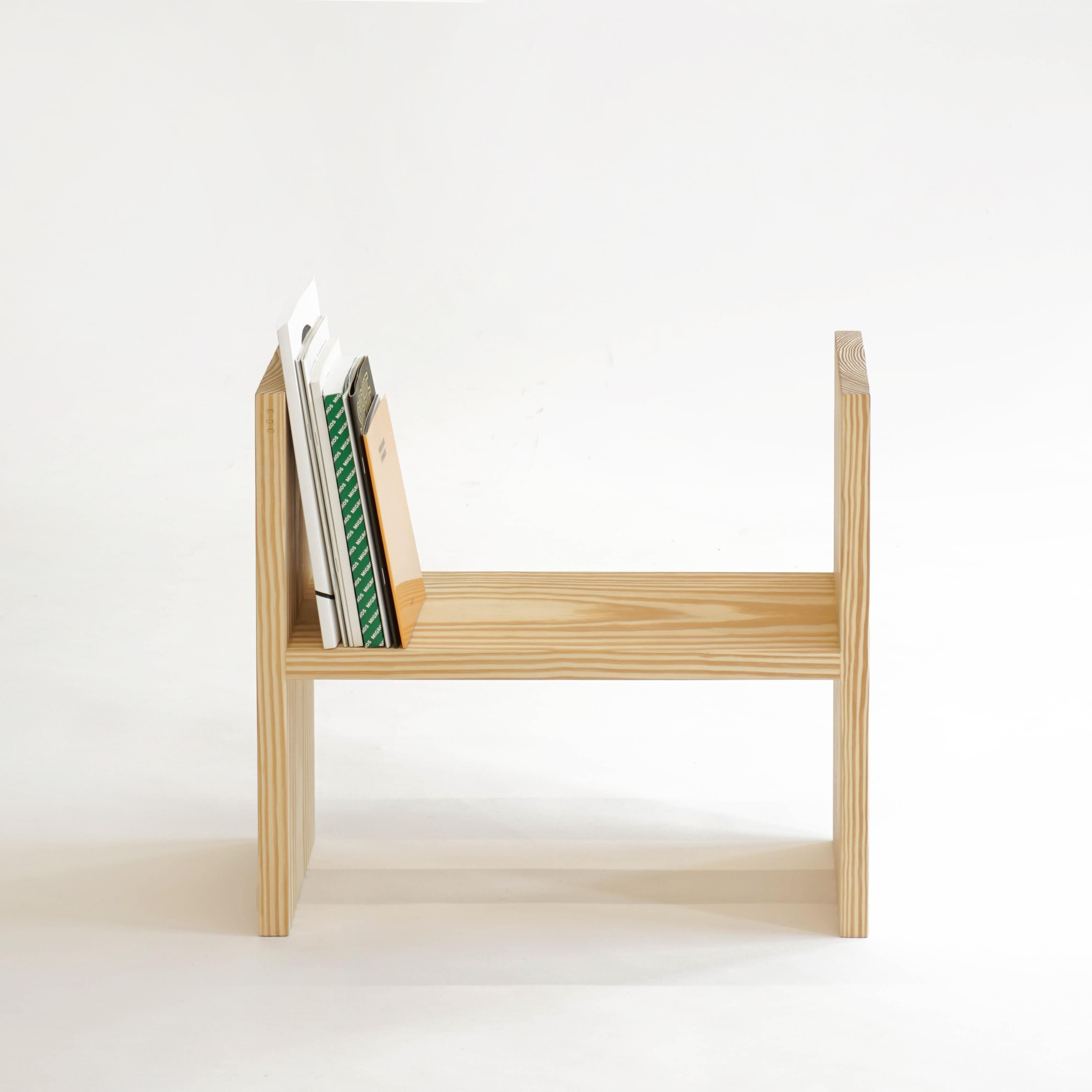 'Alexa' is a multifunctional furniture piece that can serve as a small bookshelf or a side table with just 1 turn. It is part of the furniture series 'Wolo' by Belgian artist Sophie Nys for Brussels gallery MANIERA. It is made from yellow pine and