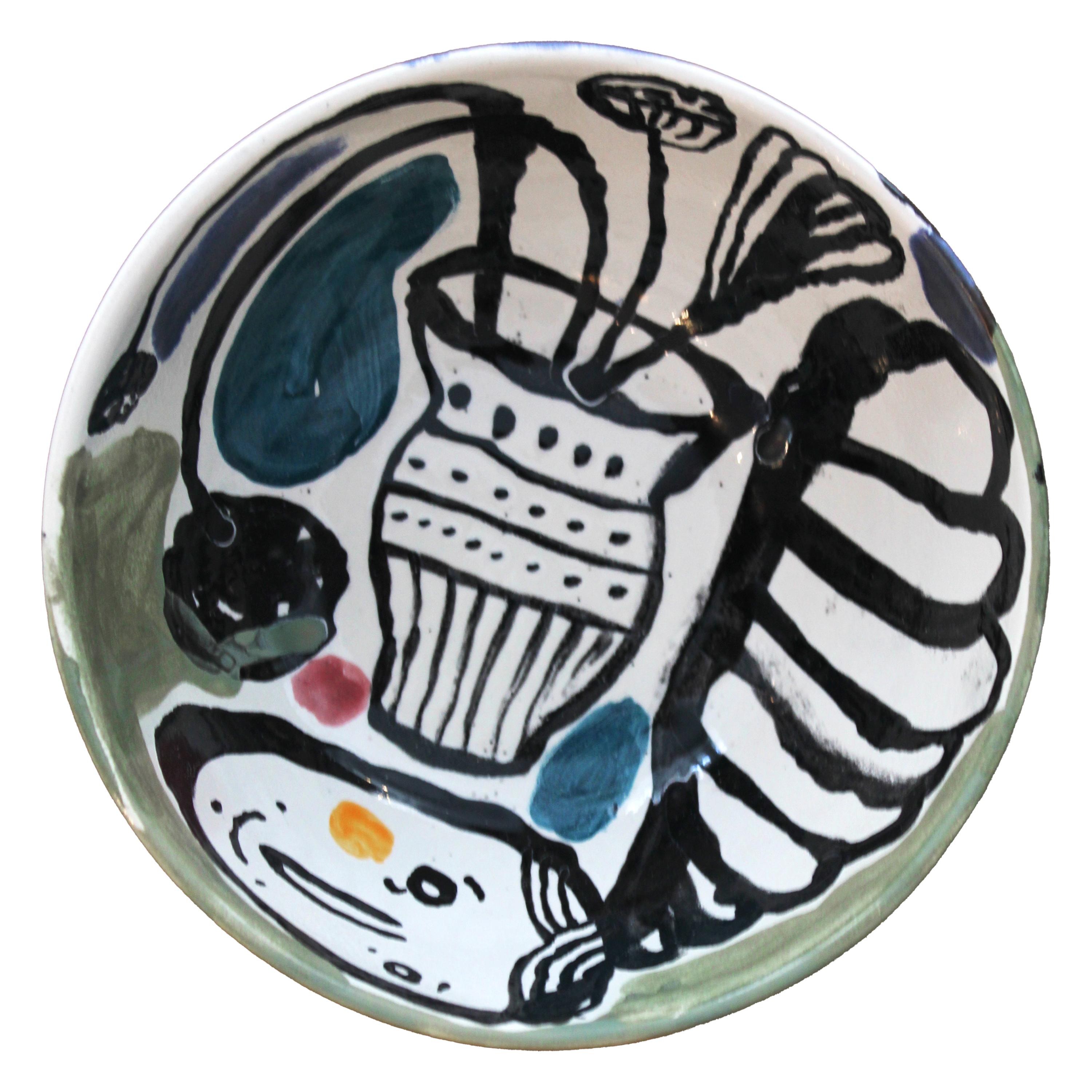 This one-of-a-kind ceramic piece is part of The Table Project, a collaborative initiative developed in Spain in 2024. Originally designed by Isidro Blasco, the work has been artistically intervened by Luis Salaberría, a visual artist whose practice