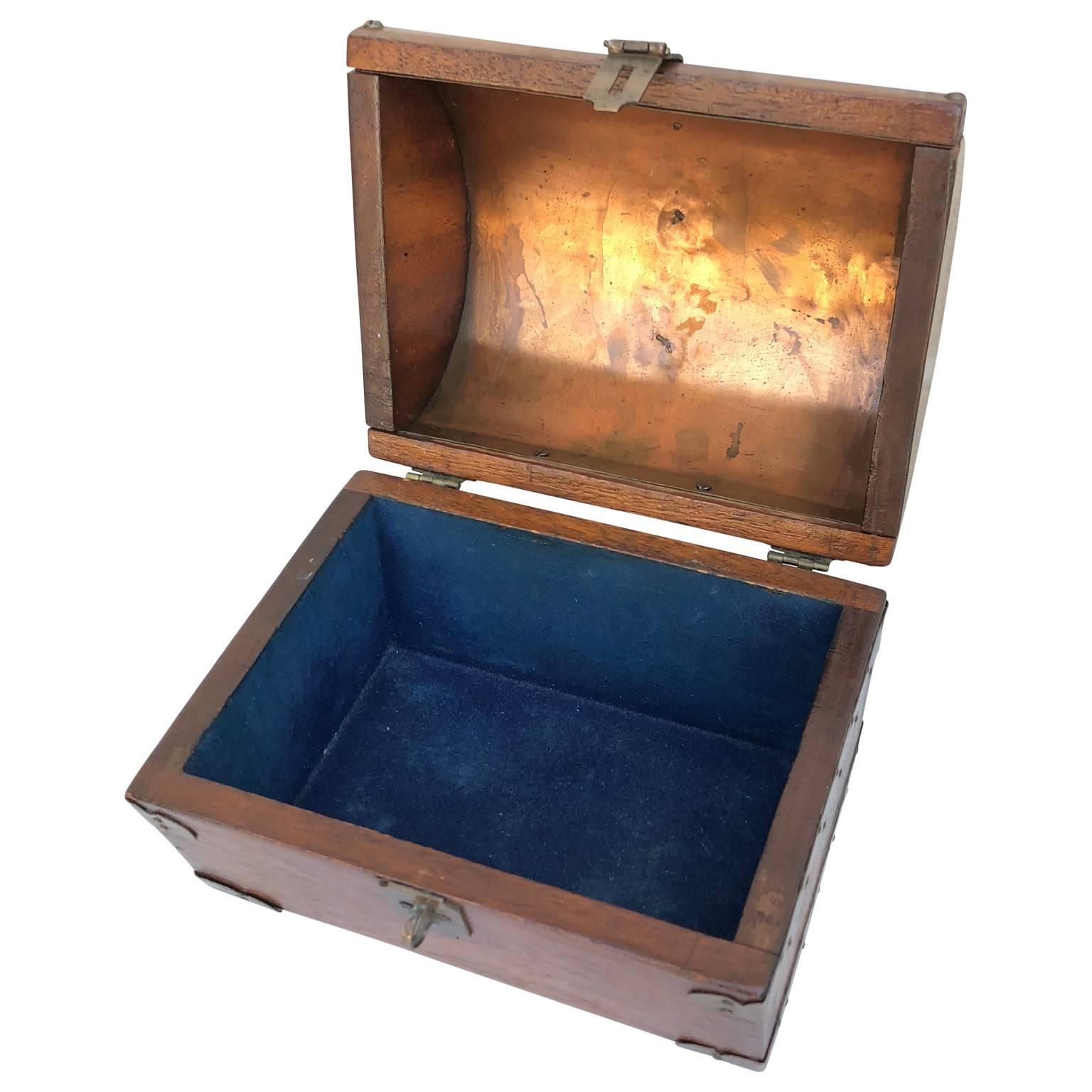 Small brass and copper plated wooden jewelry casket.