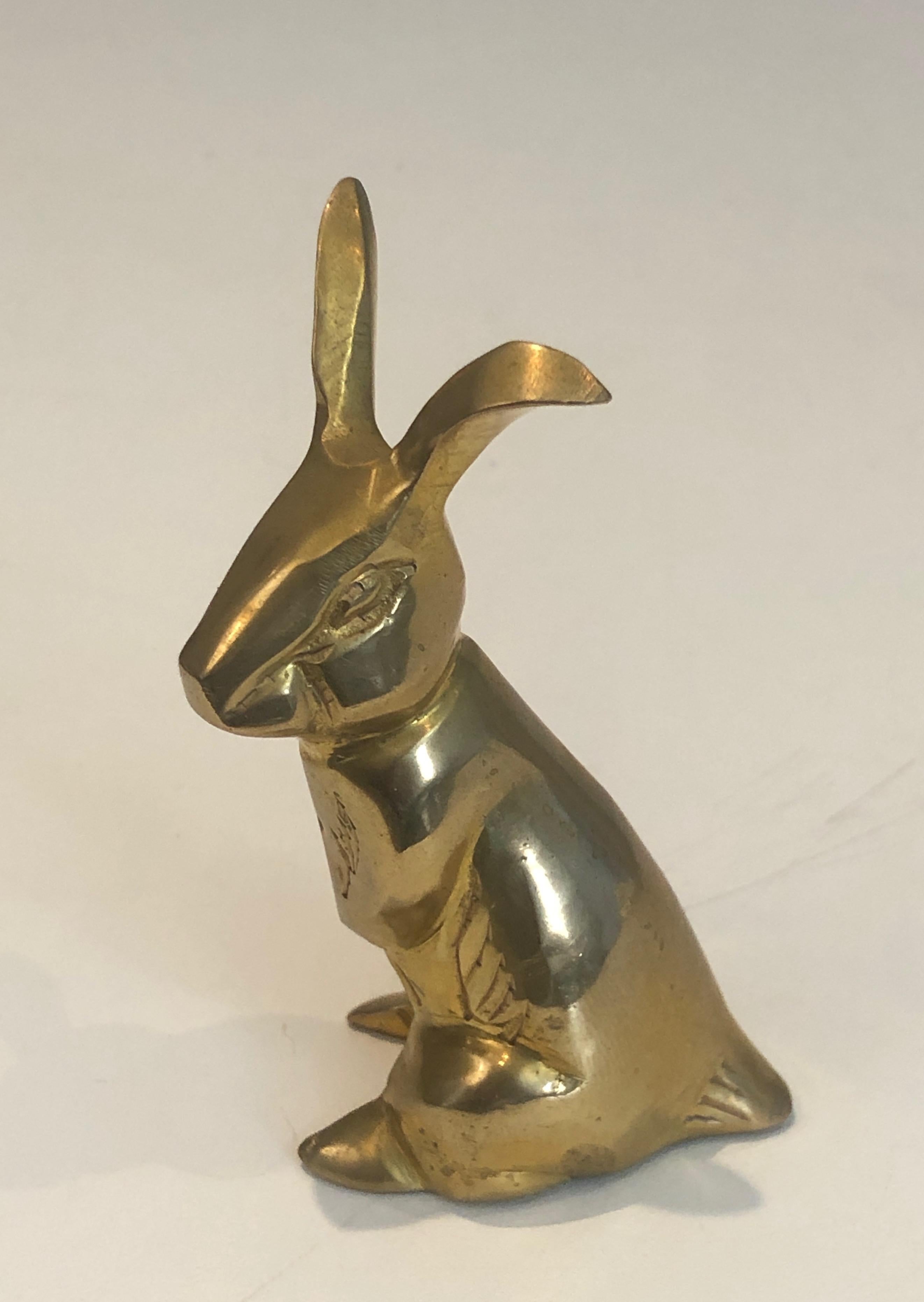 This small rabbit sculpture is made of brass. This is a French work, circa 1970.