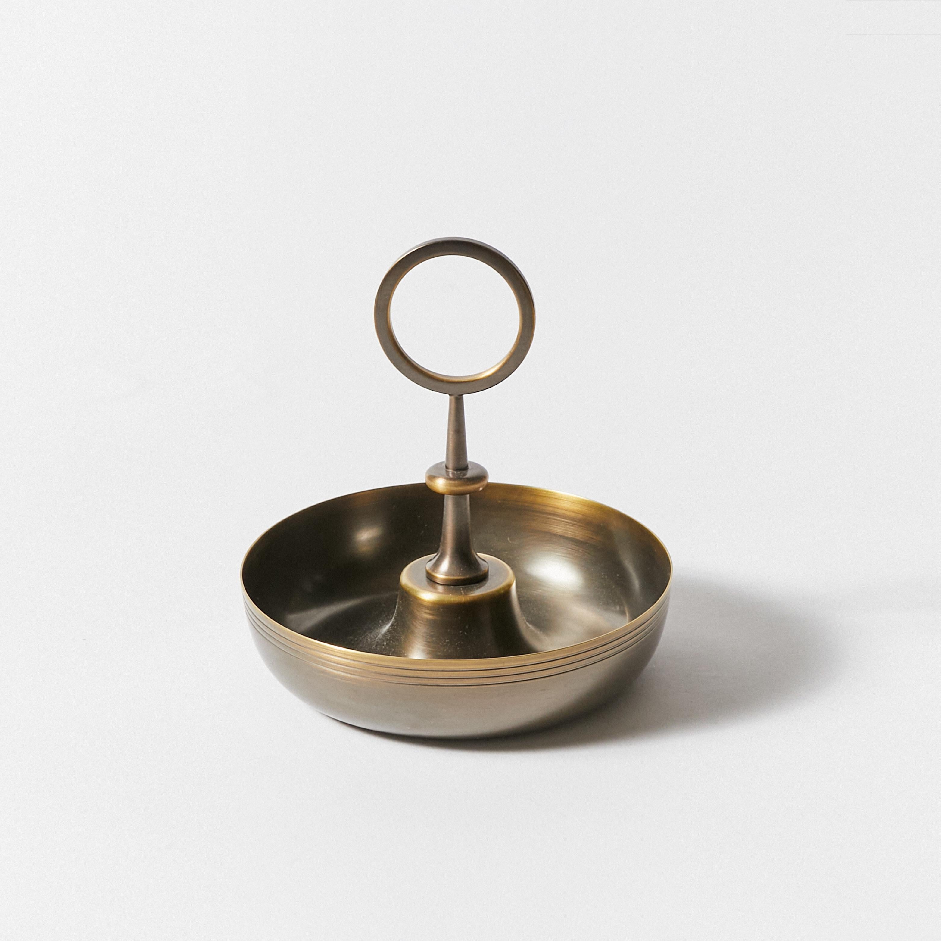 Small serving bowl designed by Tommi Parzinger for Dorlyn-Silversmiths. Re-finished in antique bronze. Signature stamp on bottom.