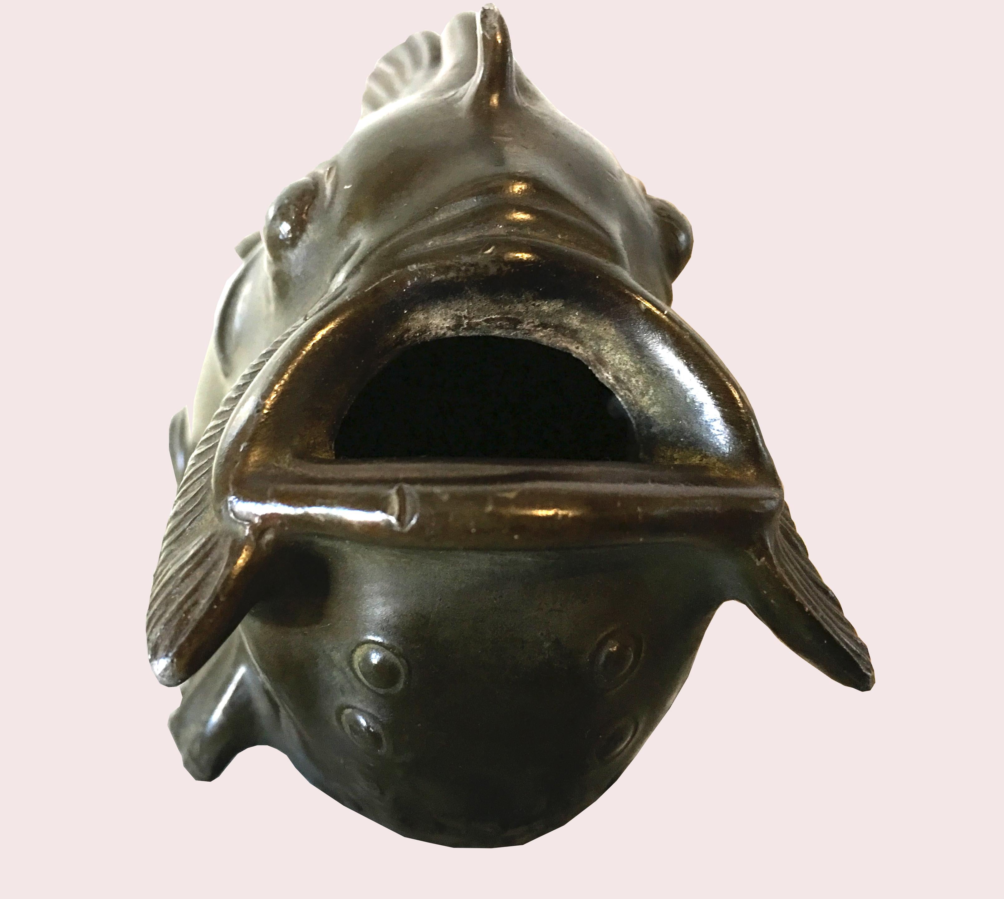 This fabulous little fish is so ugly it's beautiful! It is in very good original condition and is fully stamped beneath the base. It is made from Bronze Patinated 'Disko Metal' an alloy which was of Just's own recipe.