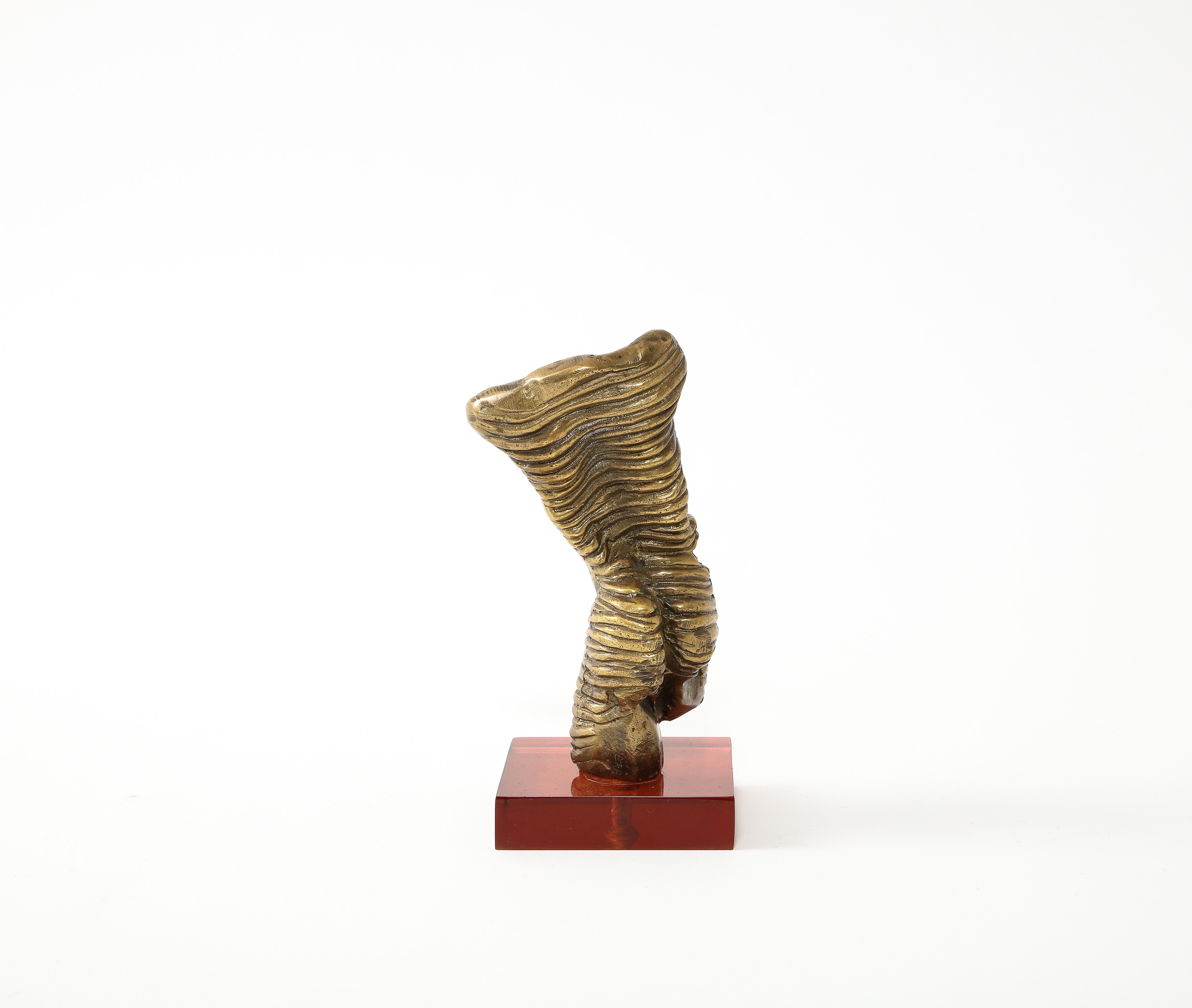 Cast Small Bronze Ribbed Torquing Figure on Color Acrylic Base, France 1970's For Sale