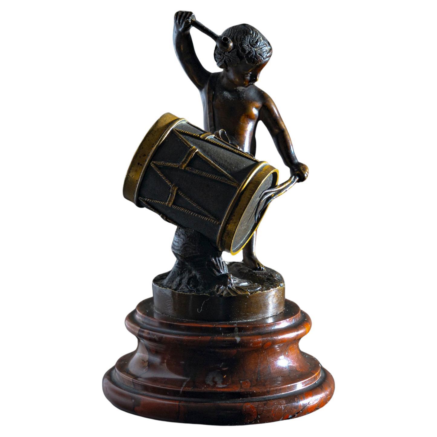 Small Bronze Sculpture of a drumming child, Late 19th Century