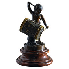 Small Bronze Sculpture of a drumming child, Late 19th Century