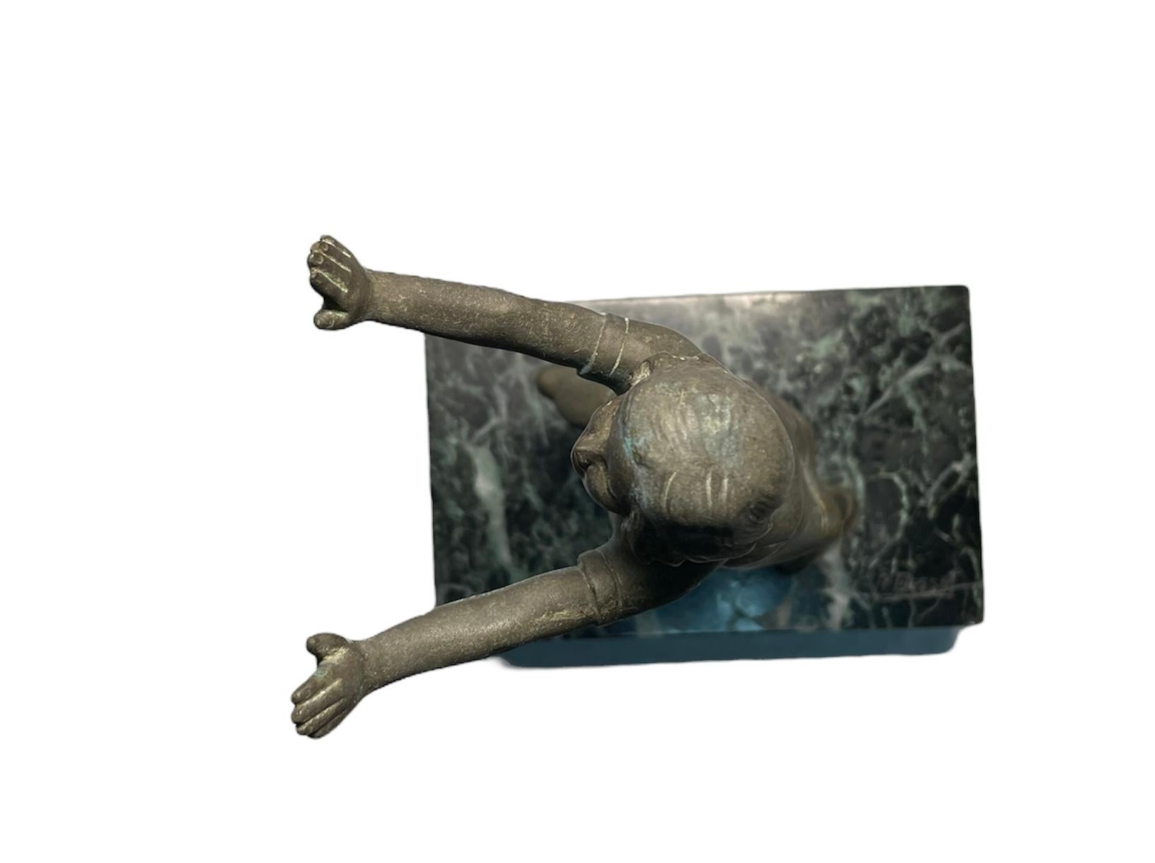 Cast Small Bronze Sculpture Of A Girl Who Is Stretching 