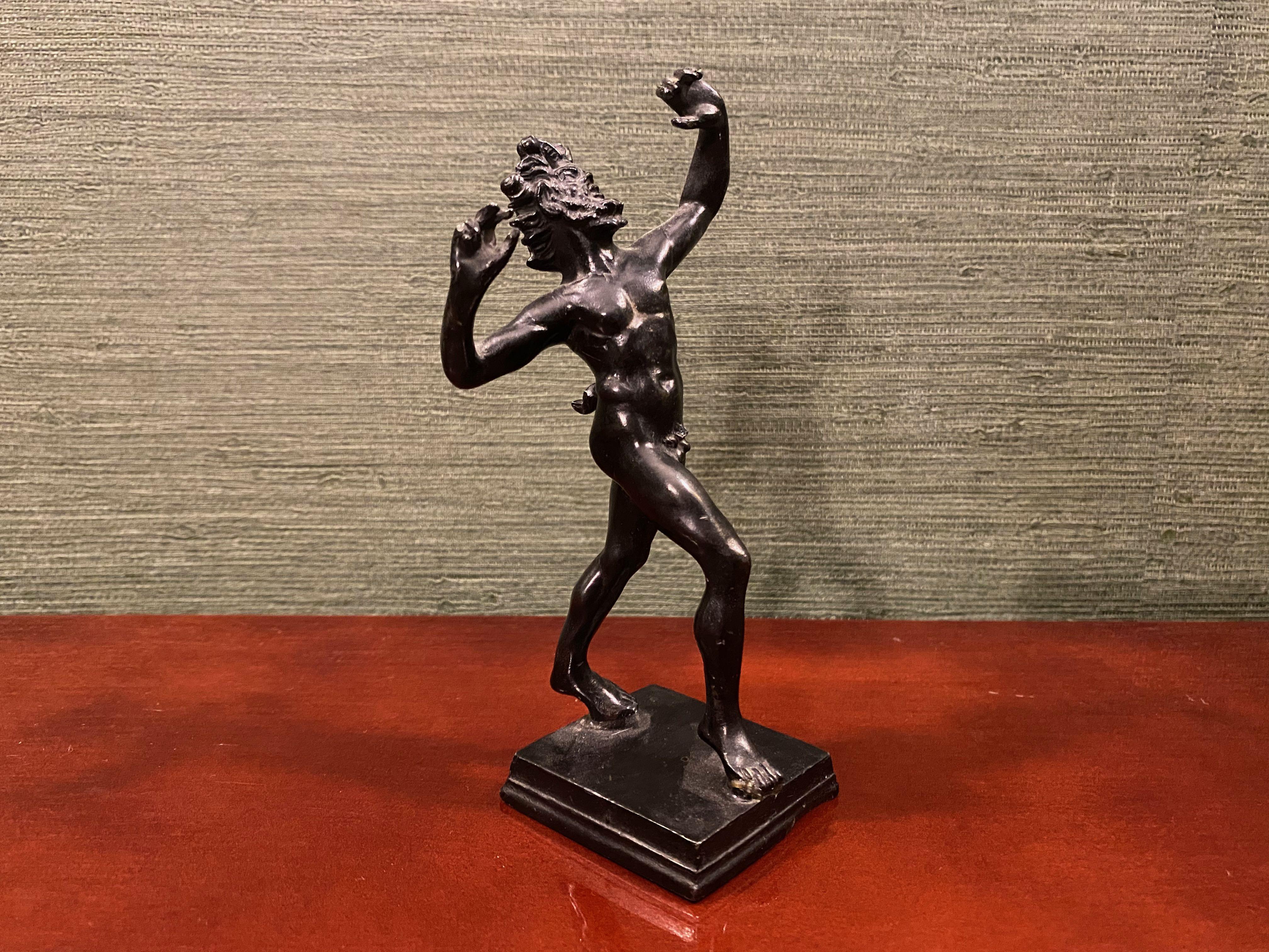 Dancing Faun of Pompeii

Cast in bronze

On square base.
 