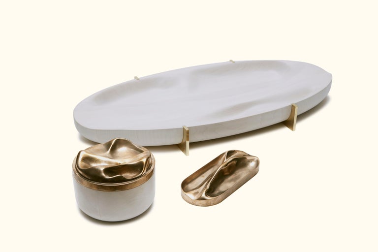 Polished and aged cast bronze tray by Vincent Pocsik in collaboration with Lawson-Fenning. Made of natural materials, this decorative object can be accessorized on table top, book shelf, or desk to achieve an organic modern style. 

Vincent Pocsik