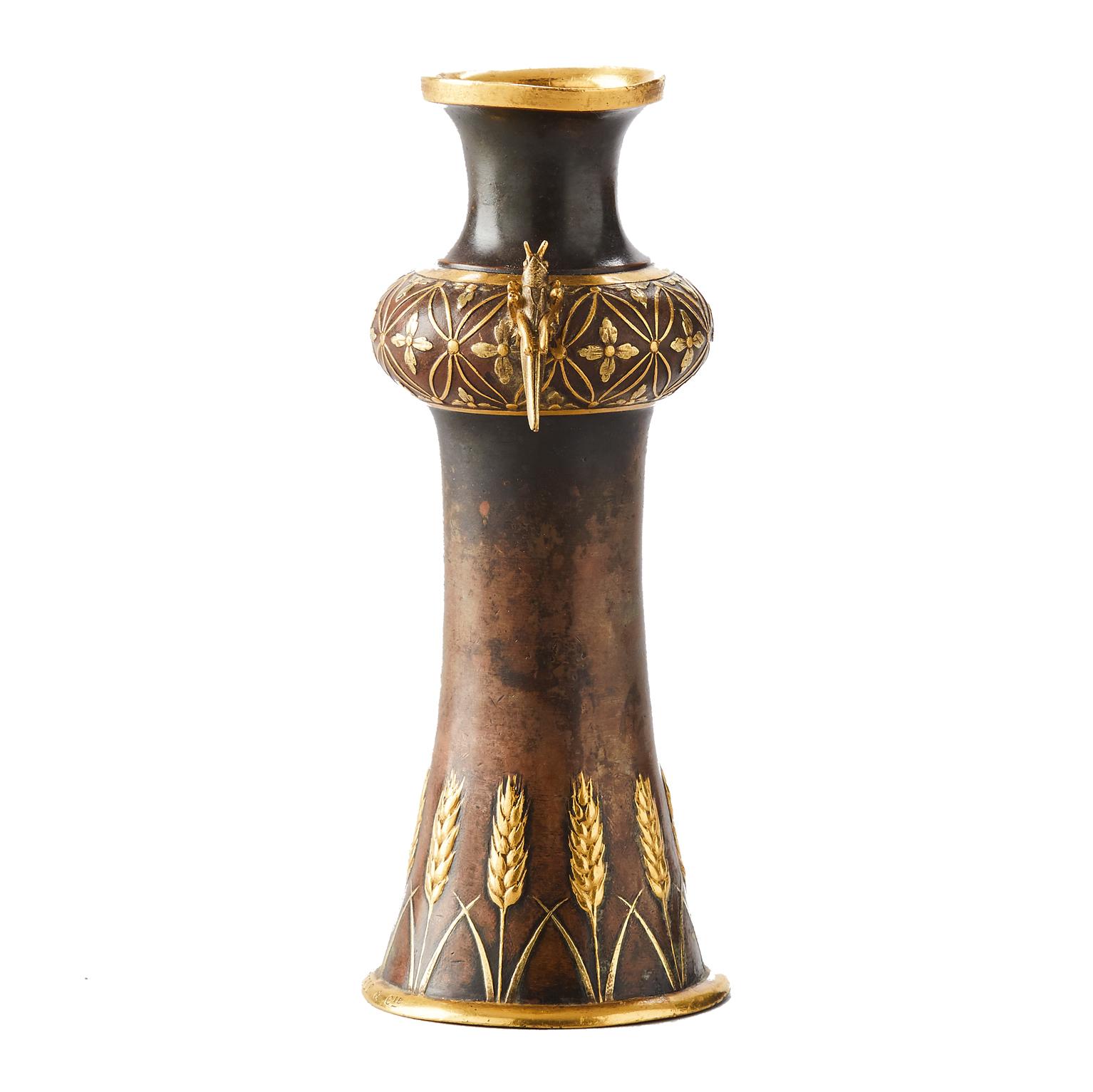 A Bronze Vase, chiseled and partially gilt bronze en relief decorated with grasshoppers and wheat axes. The best of French Art Nouveau, Christofle et Cie by Emilé Reiber, Paris 1970s. Emilé Reiber, 1826-1893. 
Stamped.
Measures: 13.5 x 5 cm