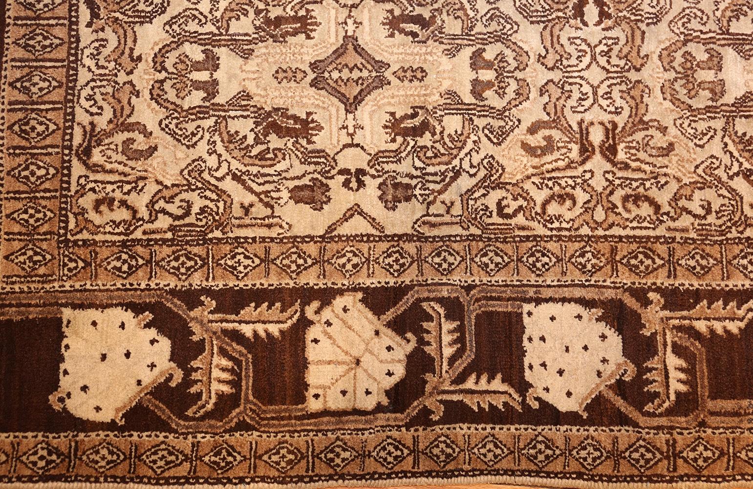 Beautiful small size brown and ivory antique Oriental Indian Agra rug, origin: India, circa early 20th century. Size: 4 ft. x 6 ft. 8 in (1.22 m x 2.03 m)


