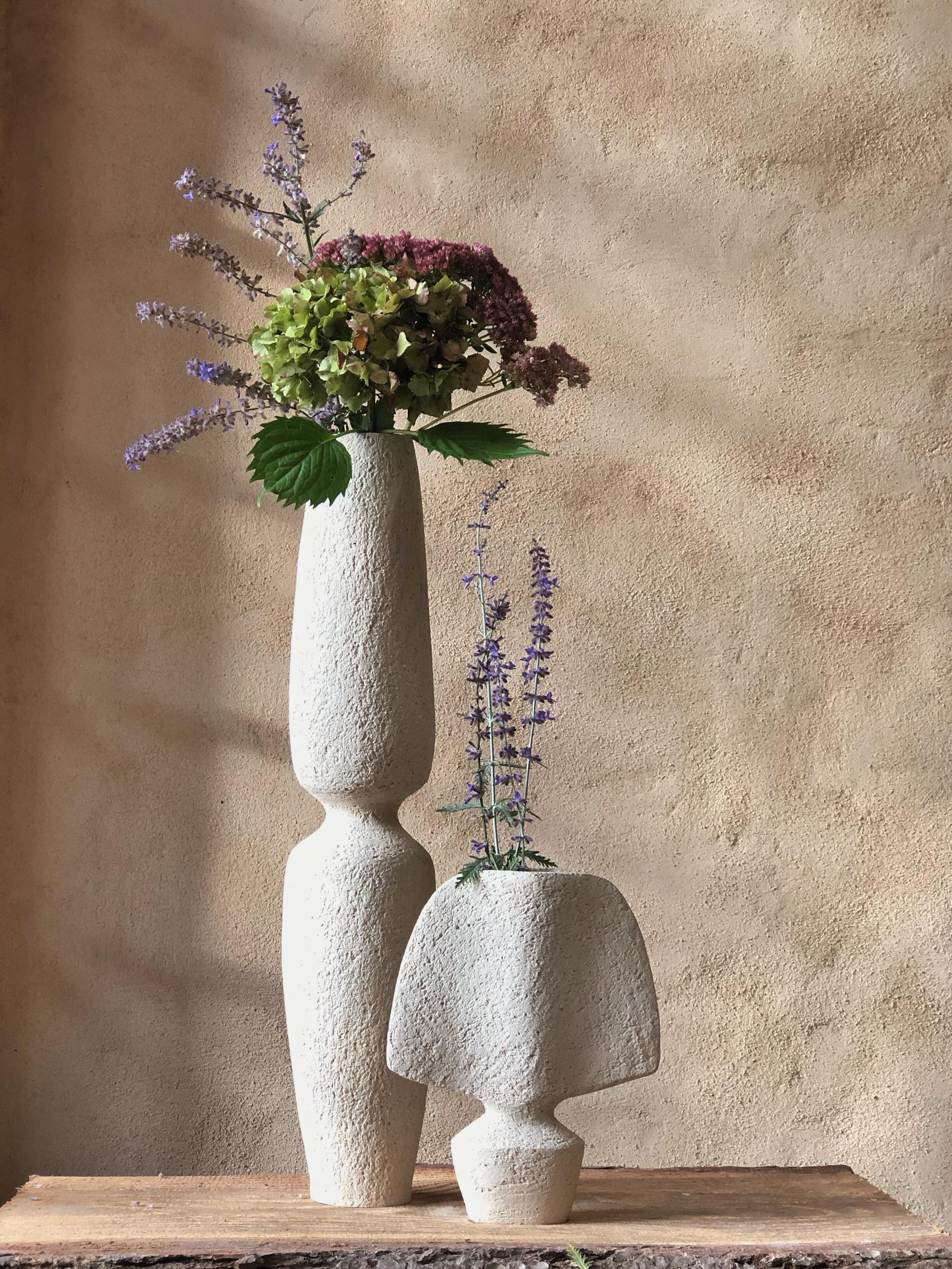 Small Brutal Vase by Sophie Vaidie
One Of A Kind.
Dimensions: 6 x W 21 x H 26 cm.
Materials: Beige stoneware with big chamotte.

Also available in a taller size. Please contact us. 

In the beginning, there was a need to make, with the hands, the