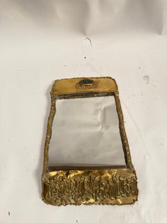 Small " brutalist" bronze wall mirror by Max Leroy