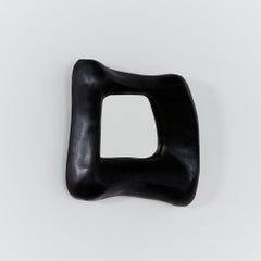 Piccolo specchio scultoreo brutalista nero ebanizzato di Christophe Daguet