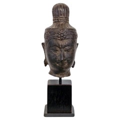 Small Buddha head in bronze