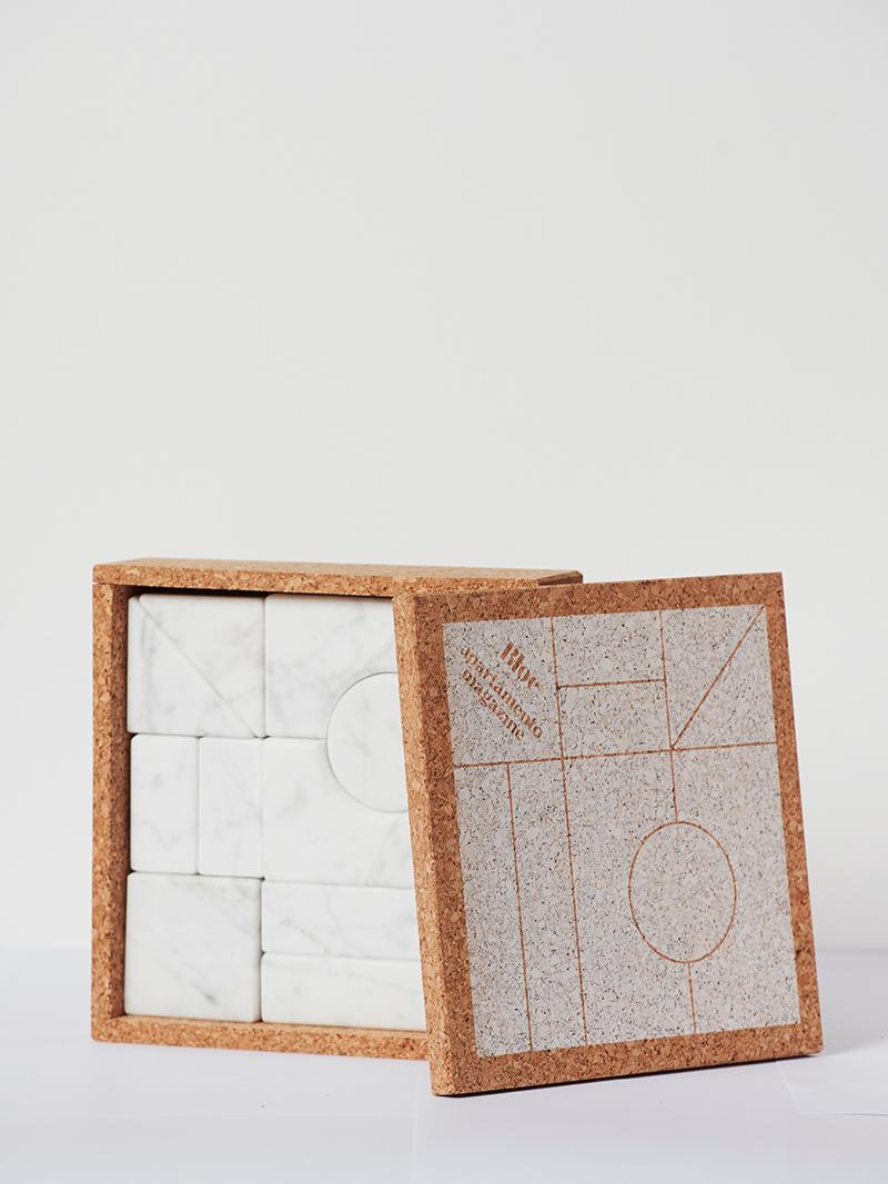 Small building decorative blocks
Dimensions: 15 x 15 x 3 cm
Type of marble: White arabescato (also available in Black Kinitra).

Inspired by the architectural nature of the timeless children’s game, Apartamento Magazine and Bloc studios have