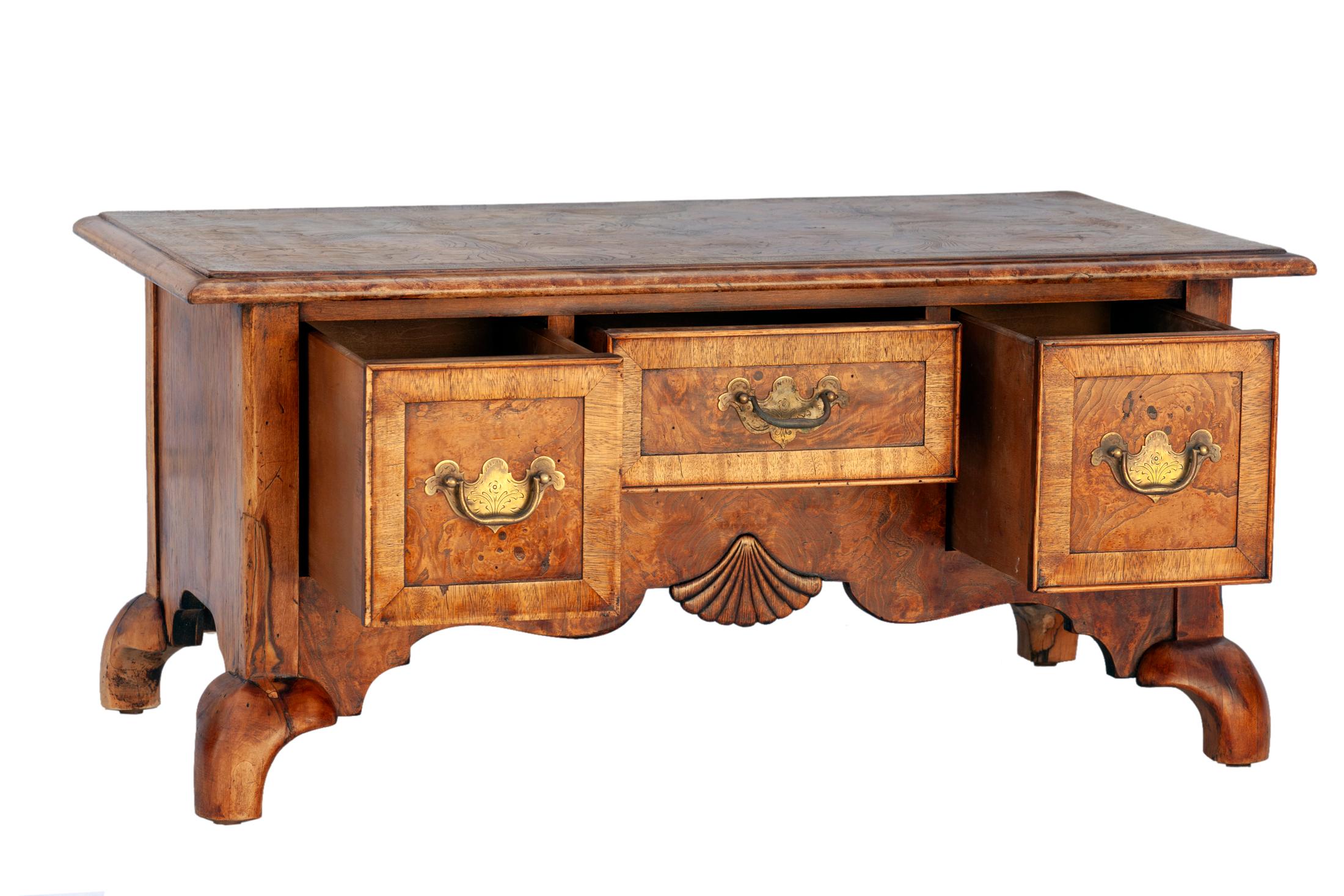 American Chippendale style burled walnut cabinet by Hekman furniture company of North Carolina. Very fine Burled walnut, brass hardware with an Asian flair. The chest has two spacious drawers with a smaller center drawer, below which is decorated