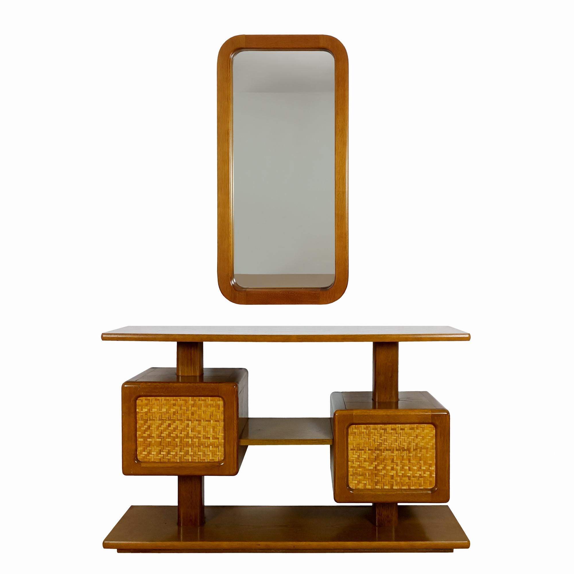 Small cabinet-console and its mirror in solid wood and chipboard veneered in oak; doors decorated with straw marquetry.

Spain c.1970.

Dimensions

CABINET: cm 120 x 30 x 73     inches 47.24 x 11.81 x 28.74

MIRROR:  cm 48 x 3 x 94,5      inches