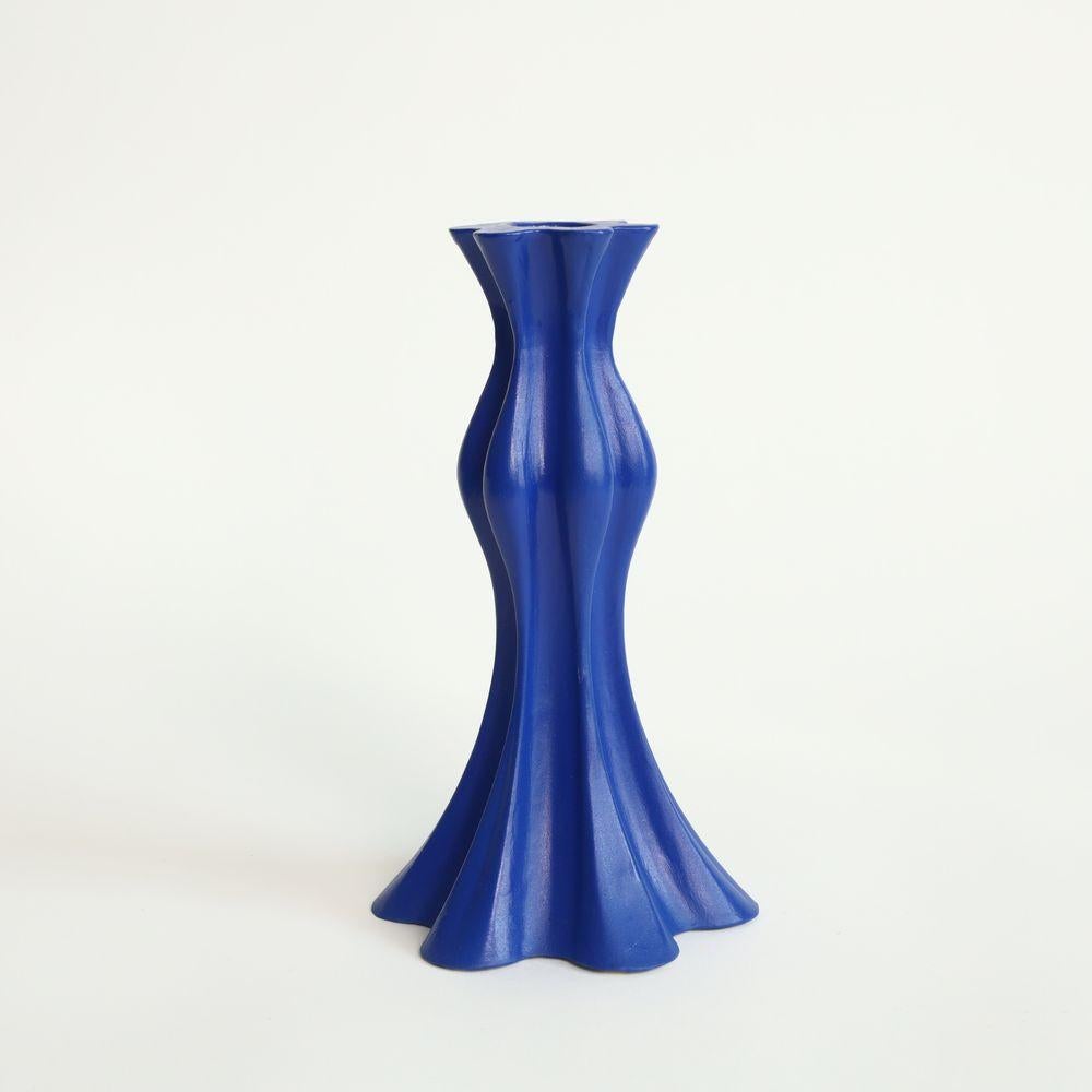 Small Candlestick in Cobalt
Capillary Waves are one of nature’s most inspirational formations due to their intricate and complex nature. The candlestick takes after these patterns much like the ripple effect that can be seen when the quiet surface