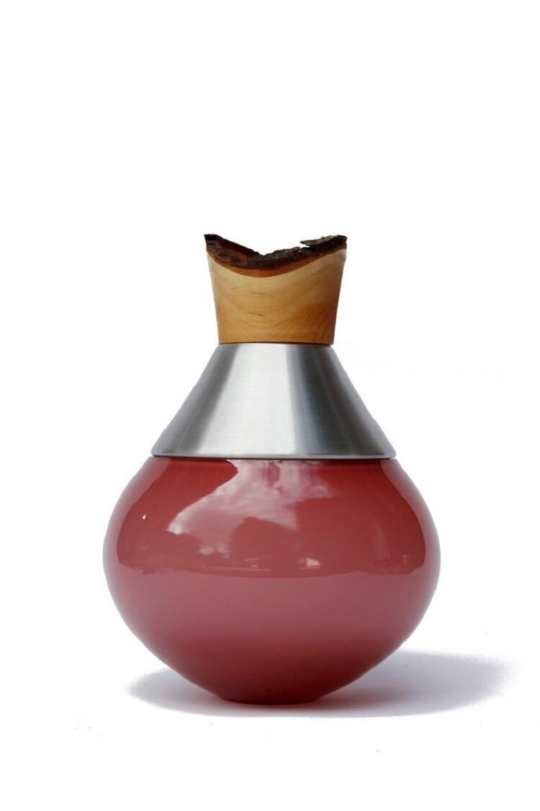 Small candy rose India Vessel II, Pia Wüstenberg
Dimensions: D 18 x H 25
Materials: glass, wood, metal
Available in other metals: brass, copper, aluminum, rust

Handmade in Europe, by individual craftsmen: handblown glass (Czech Republic), hand