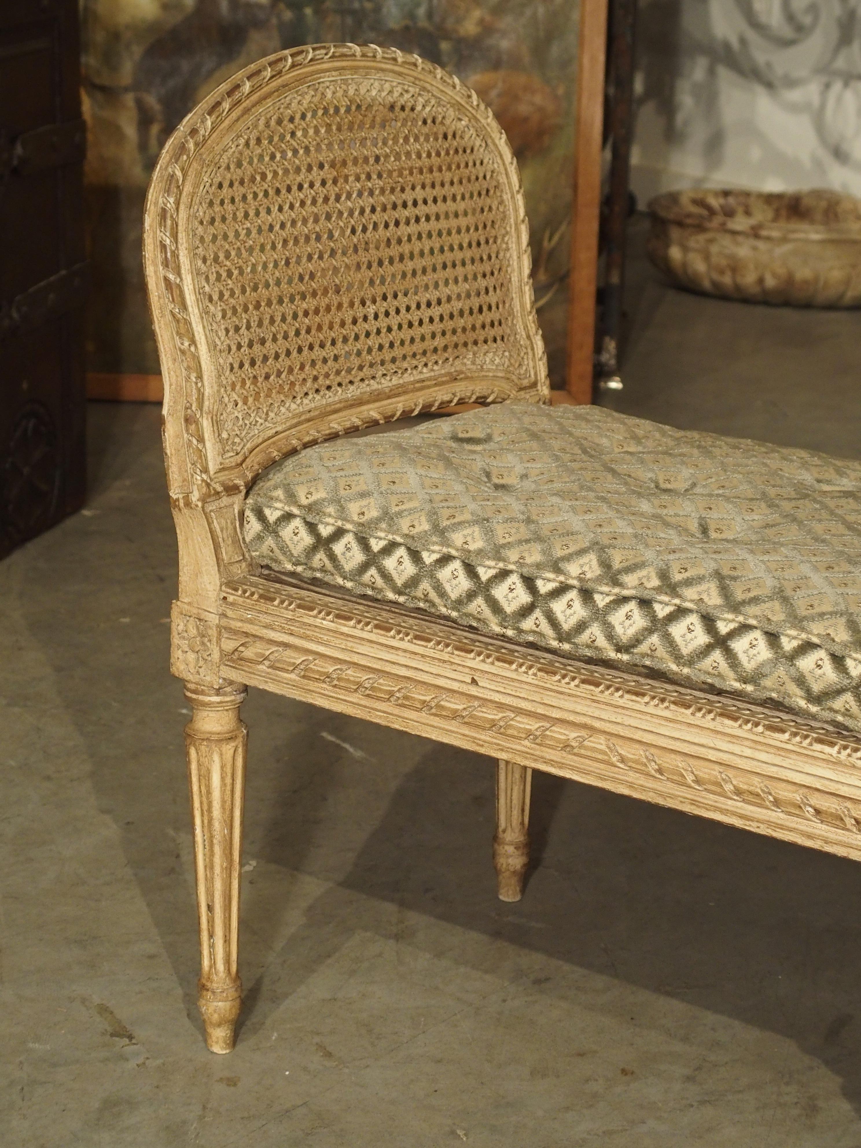 French Small Caned and Painted Louis XVI Style Banquette, Circa 1890