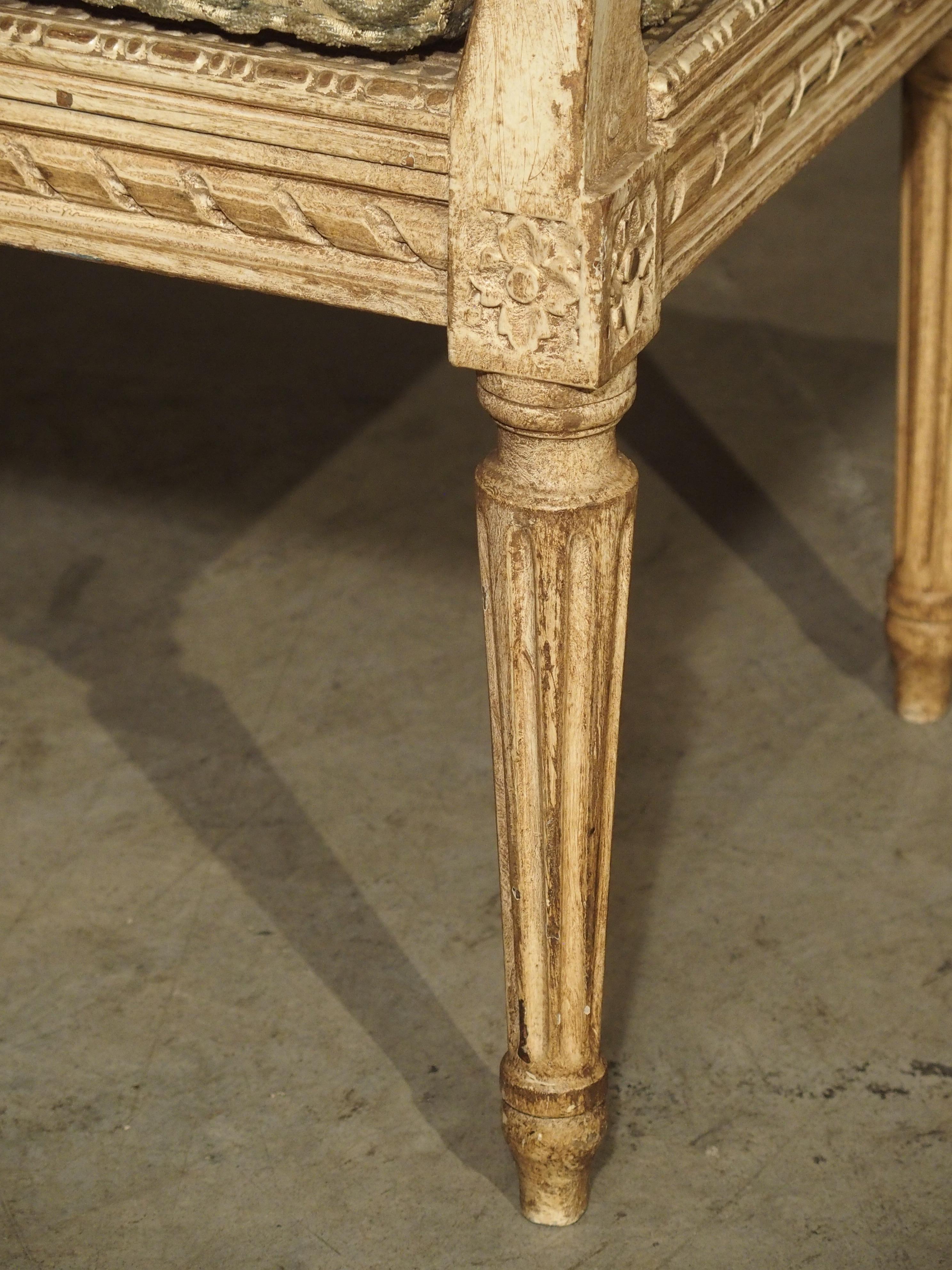 Hand-Carved Small Caned and Painted Louis XVI Style Banquette, Circa 1890