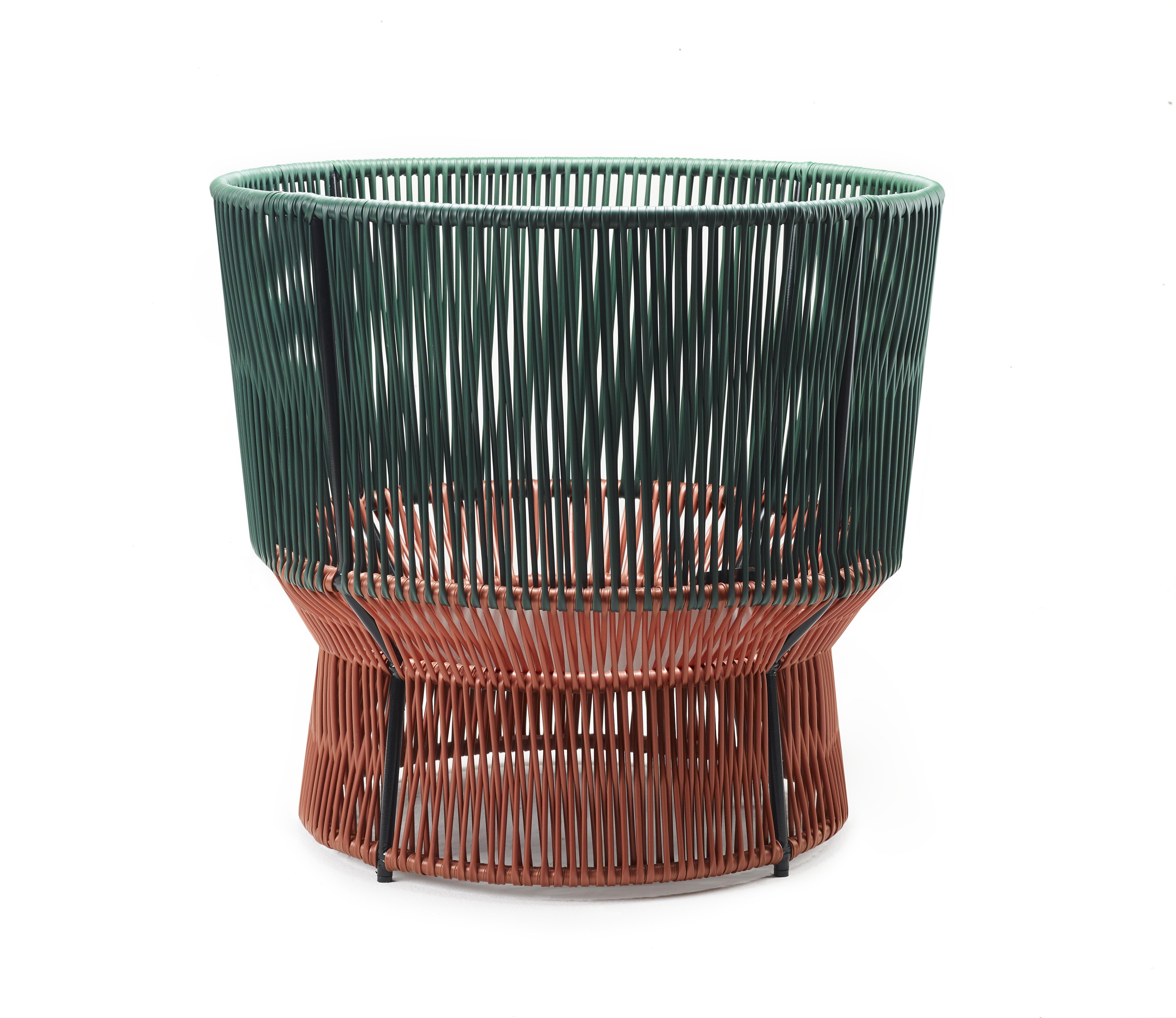 Small caribe chic basket 1 by Sebastian Herkner
Materials: Galvanized and powder-coated tubular steel. PVC strings are made from recycled plastic.
Technique: Made from recycled plastic and weaved by local craftspeople in Colombia. 
Dimensions: W