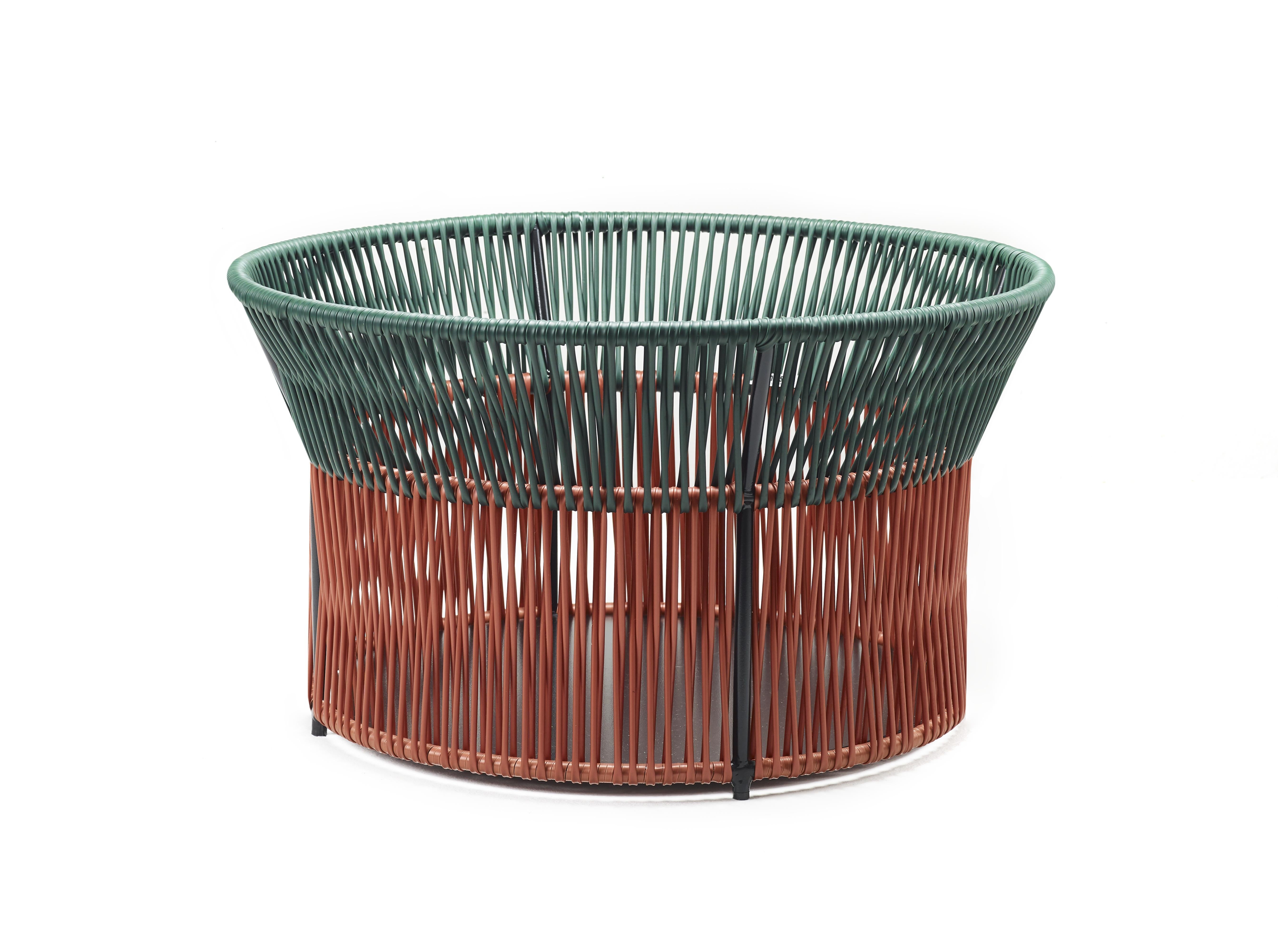 Small Caribe Chic basket 3 by Sebastian Herkner
Materials: Galvanized and powder-coated tubular steel. PVC strings are made from recycled plastic.
Technique: Made from recycled plastic and weaved by local craftspeople in Colombia. 
Dimensions: W
