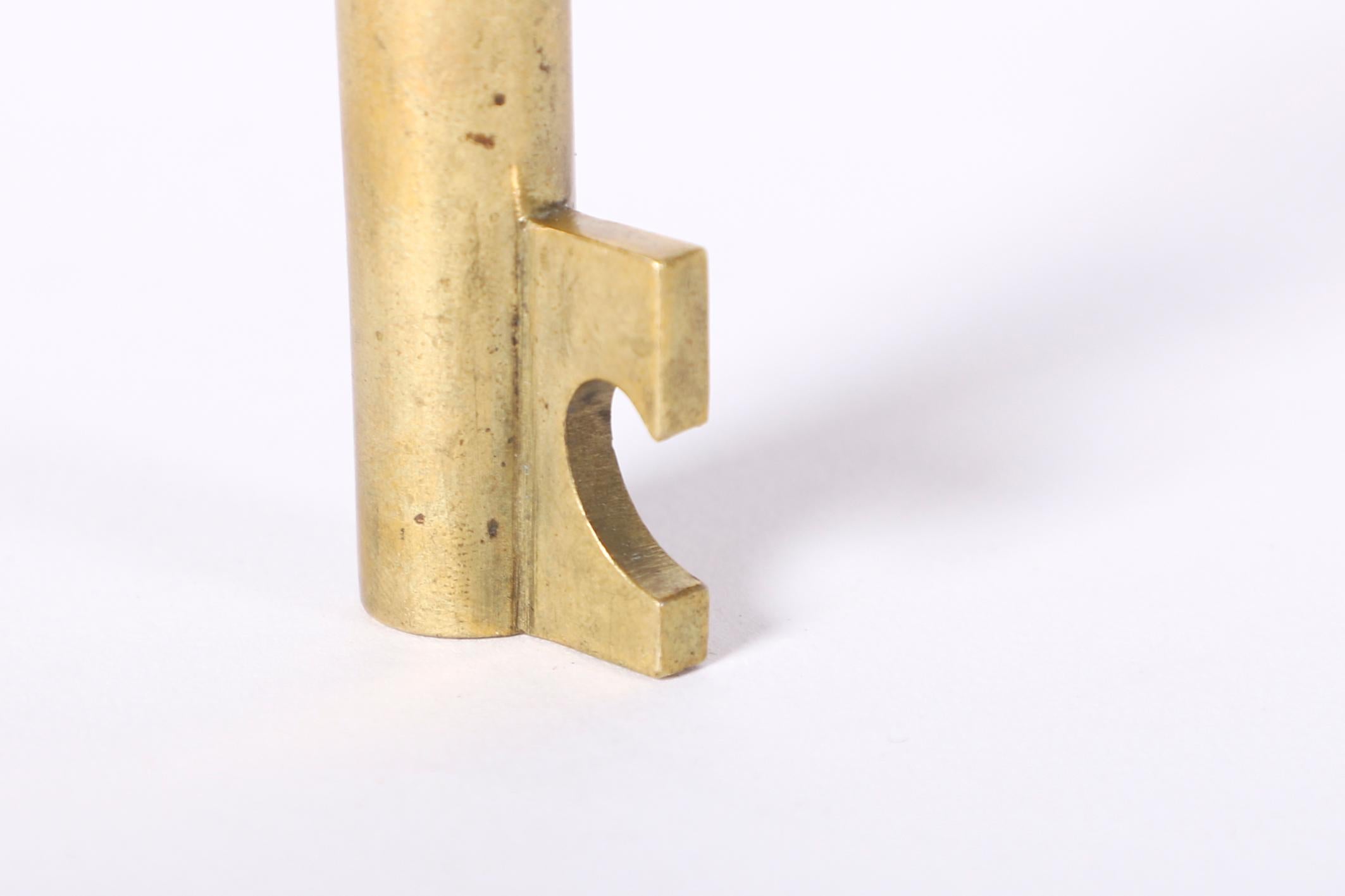 Mid-Century Modern Small Carl Auböck Heavy Brass Corkscrew in a Key Shape For Sale