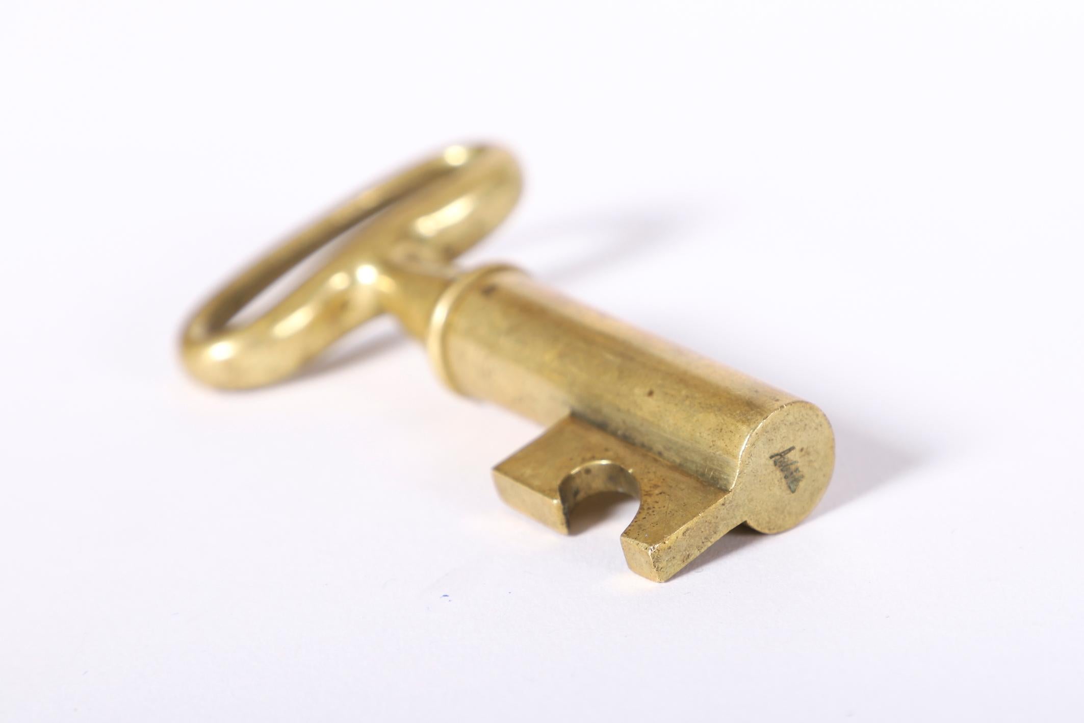 Austrian Small Carl Auböck Heavy Brass Corkscrew in a Key Shape For Sale