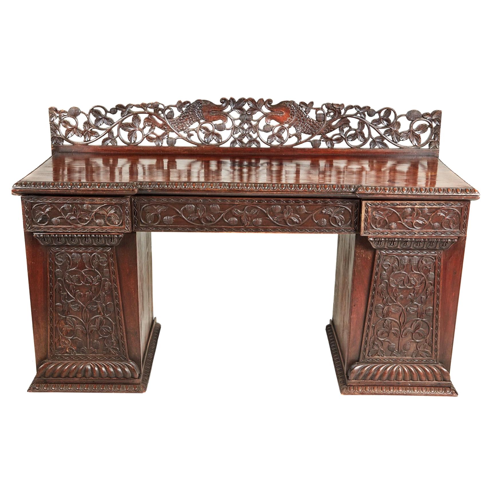 Small Carved Anglo-Indian Padouk Pedestal Sideboard For Sale