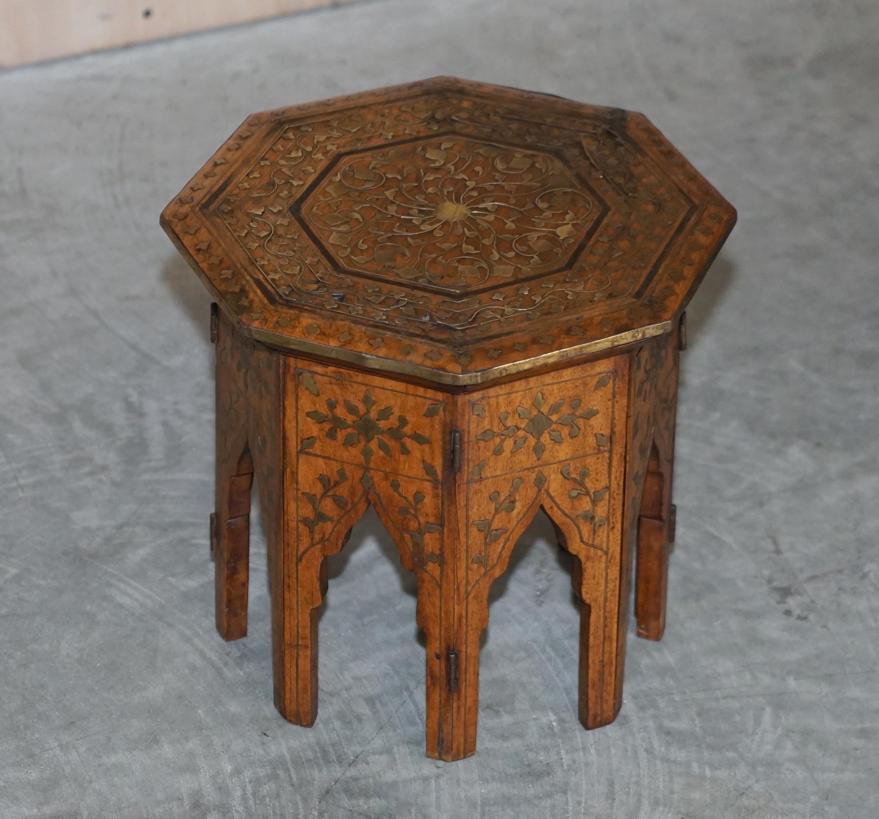 Royal House Antiques is delighted to offer for sale this lovely small hand carved from solid Rosewood with brass inlay Burmese side table

A very good looking and decorative table, this would be used as a drinks table for people sitting cross