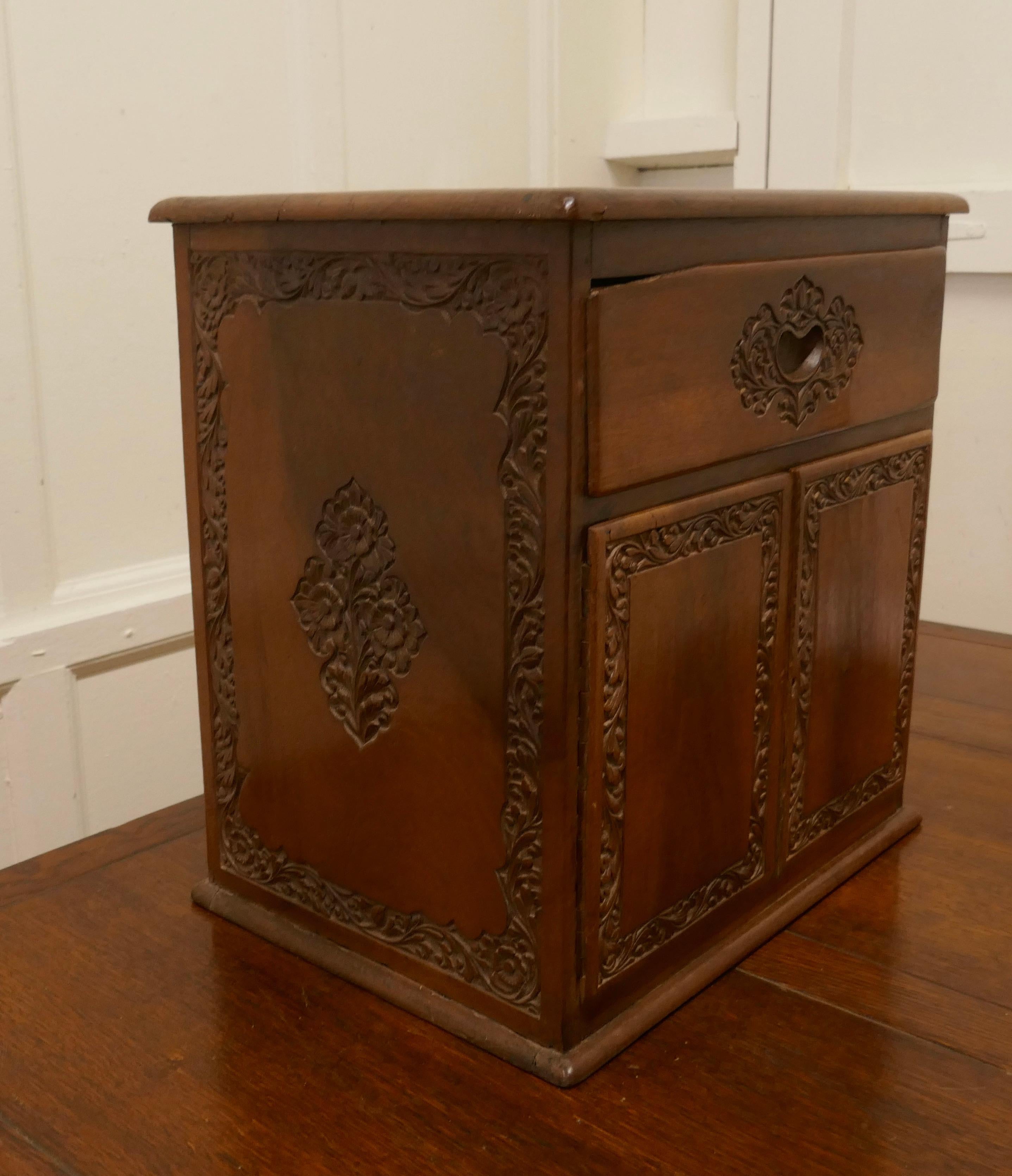 Small Carved Cupboard with Drawer In Good Condition For Sale In Godshill, Isle of Wight
