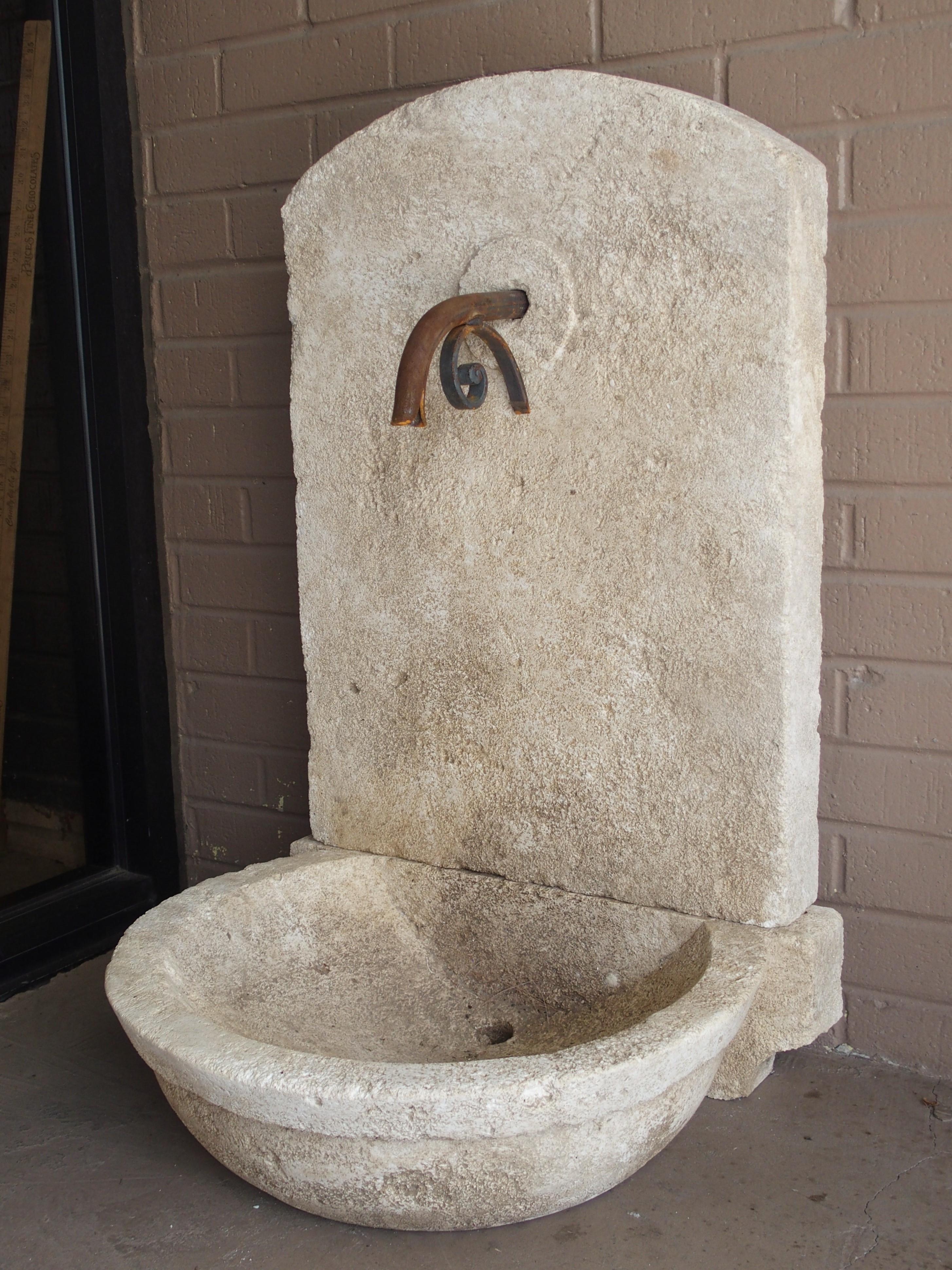 French Small Carved Limestone Wall Fountain with Circular Basin