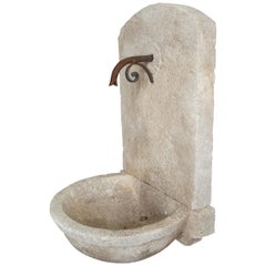 Small Carved Limestone Wall Fountain with Circular Basin