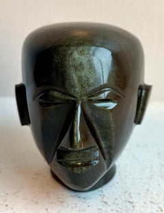 Small Carved "Obsidian" Alien Head Paperweight, artist unknown