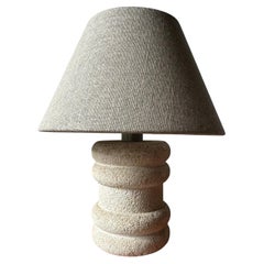 Small carved stone lamp style of Albert Tormos