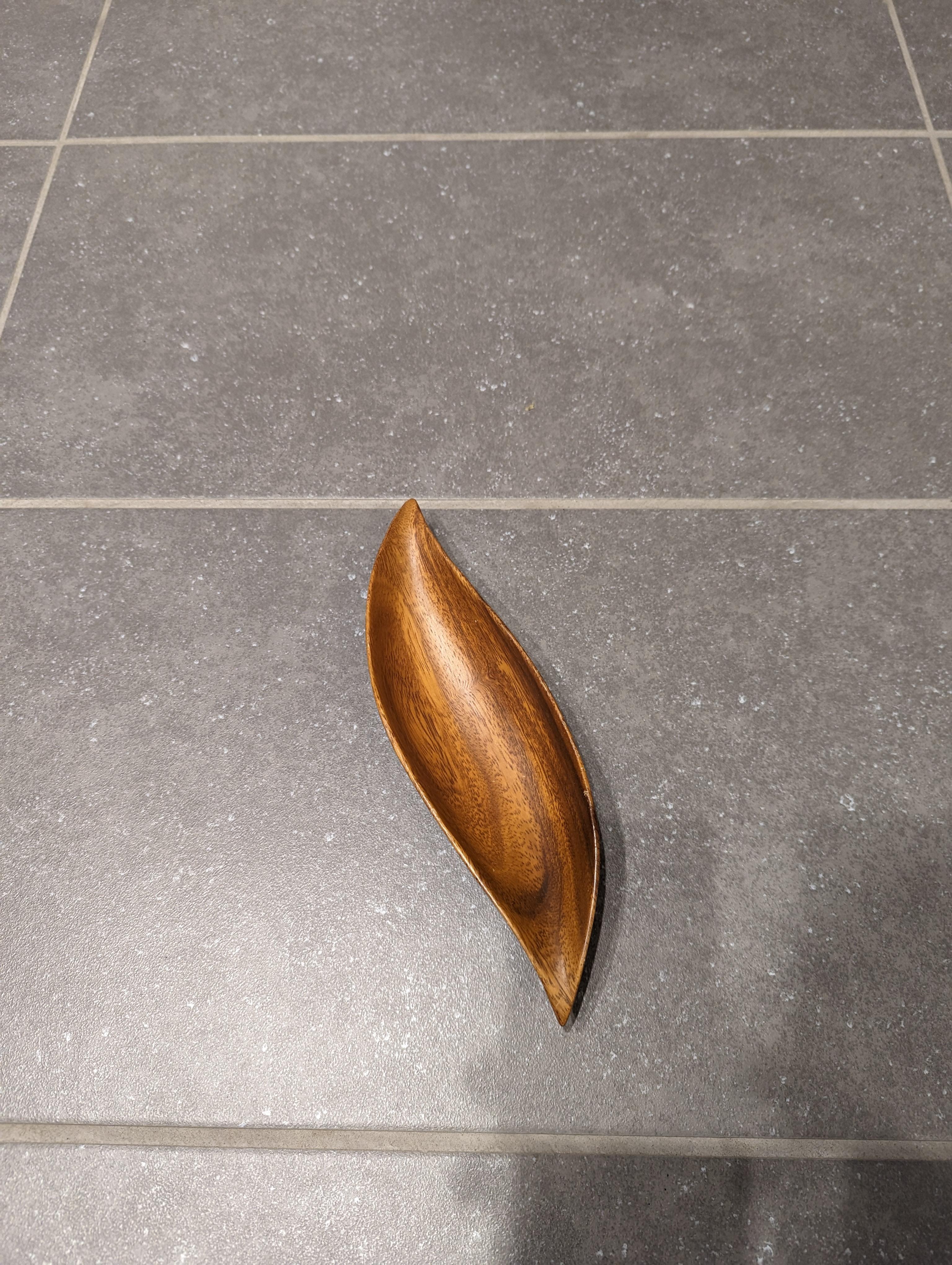 Leaf-shaped small carved wood tray. 

